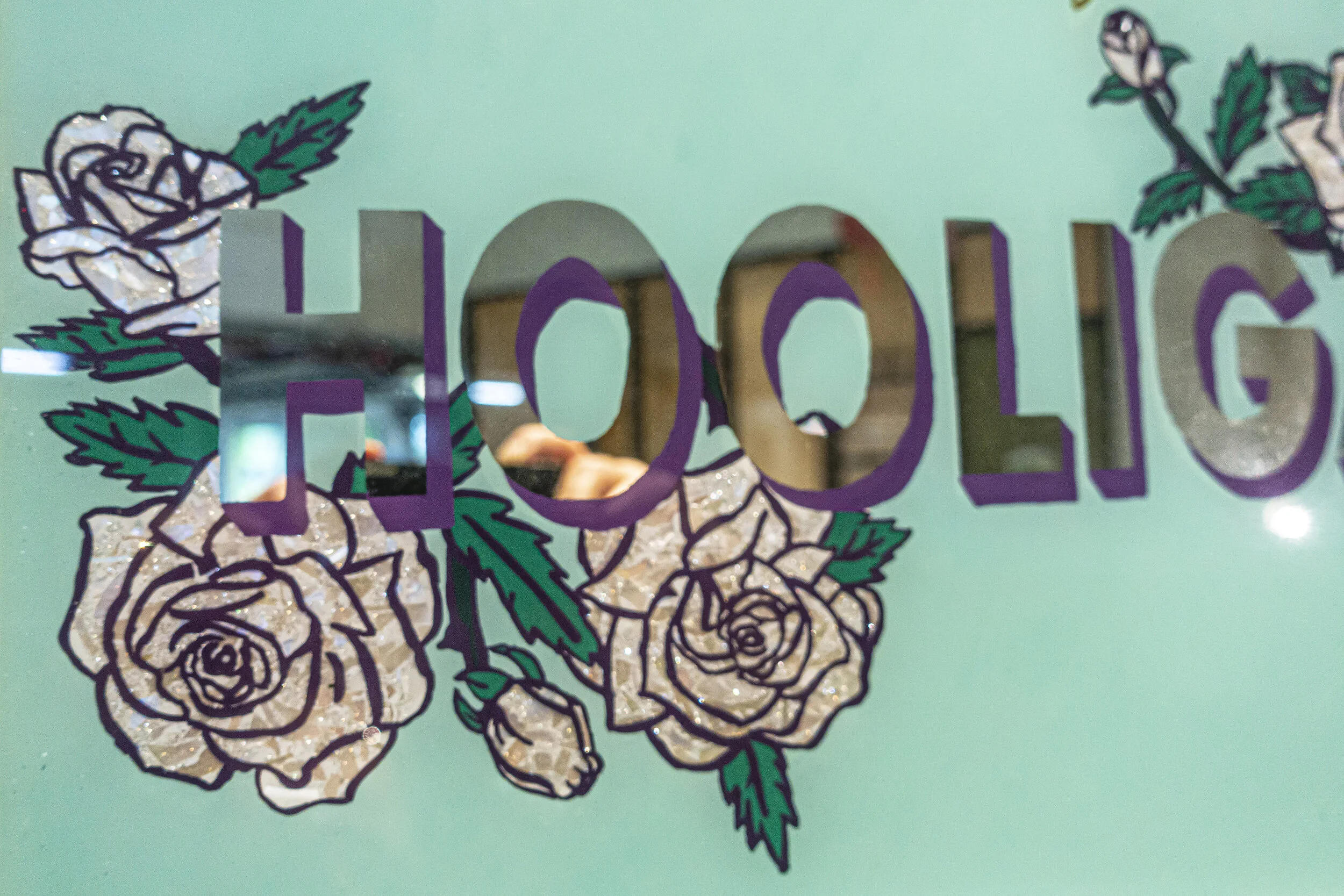 MILLIE RATCLIFF, London, UK,  I am What You Call a Hooligan,  detail  Enamel, gold leaf, and pearl shell on glass with wood frame, 17”x 24”, $300