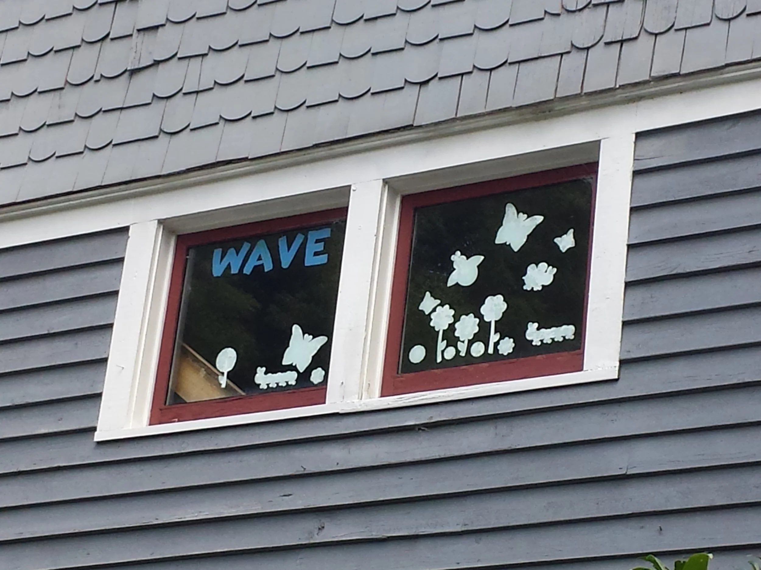OUTSIDE VIEW OF THE WAVE WINDOW AT ARTS TOGETHER.