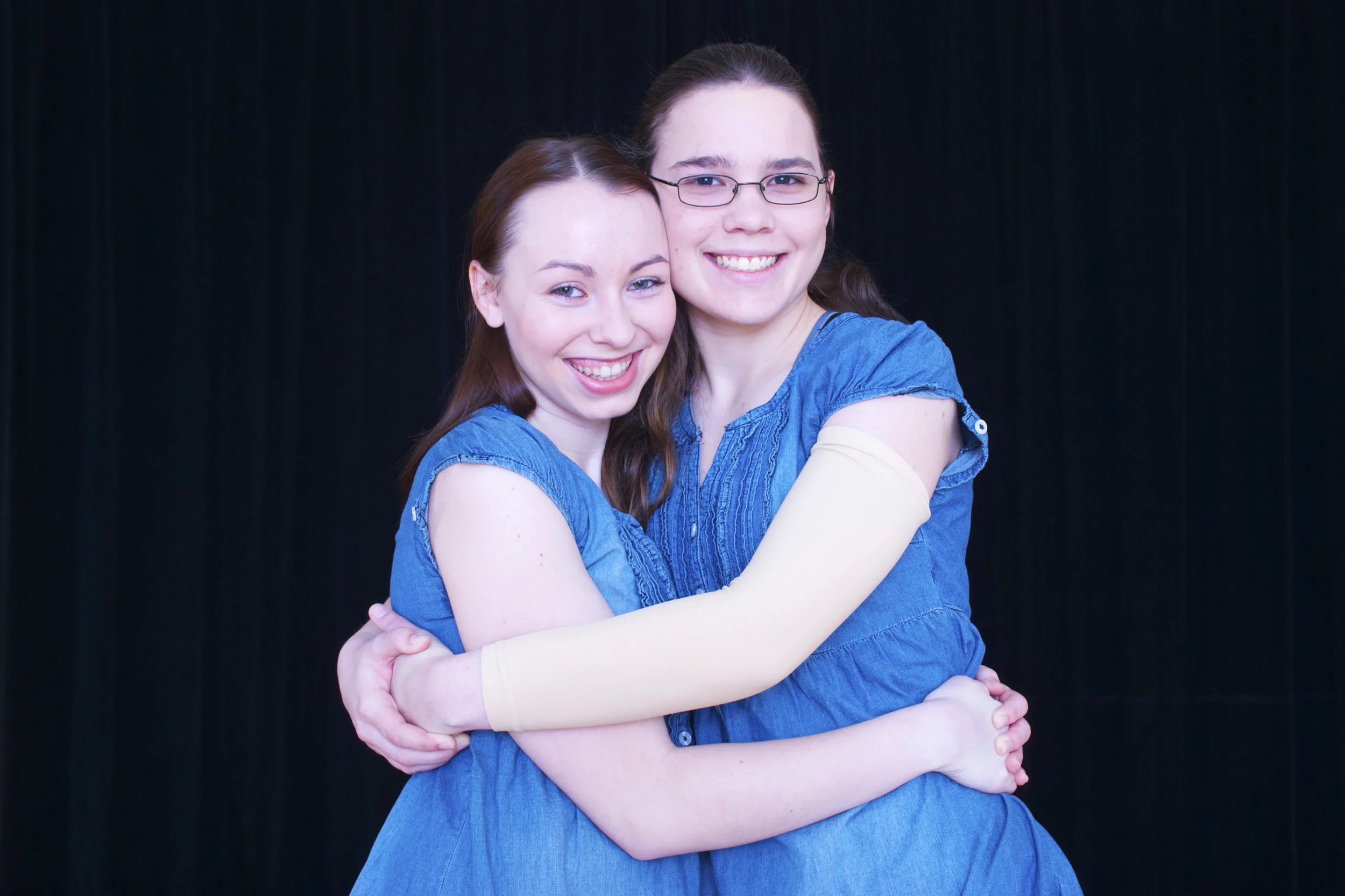 KATIE (RIGHT) WITH HER BEST DANCE FRIEND NATALIE. ABOVE IMAGE: KATIE ZOBEL PERFORMING IN THE RAINBOW DANCE CONCERT HER SENIOR YEAR.
