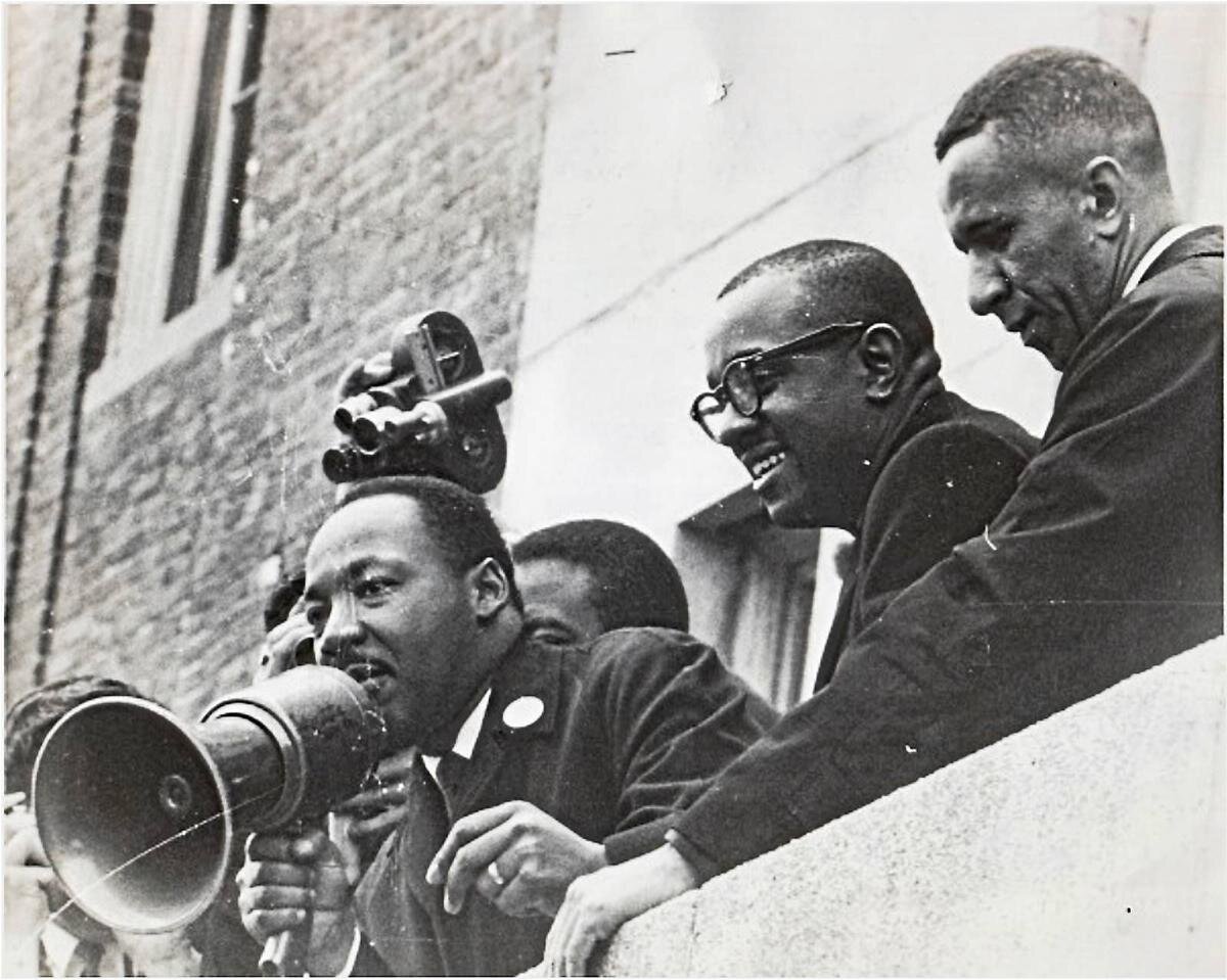 Image: Co-Executive Producer Gil Caldwell with Martin Luther King, Jr.