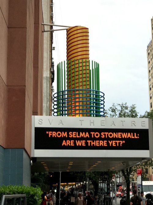 Image: A digital banner outside the SVA Theater in New York City that says "From Selma to Stonewall: Are We There Yet"