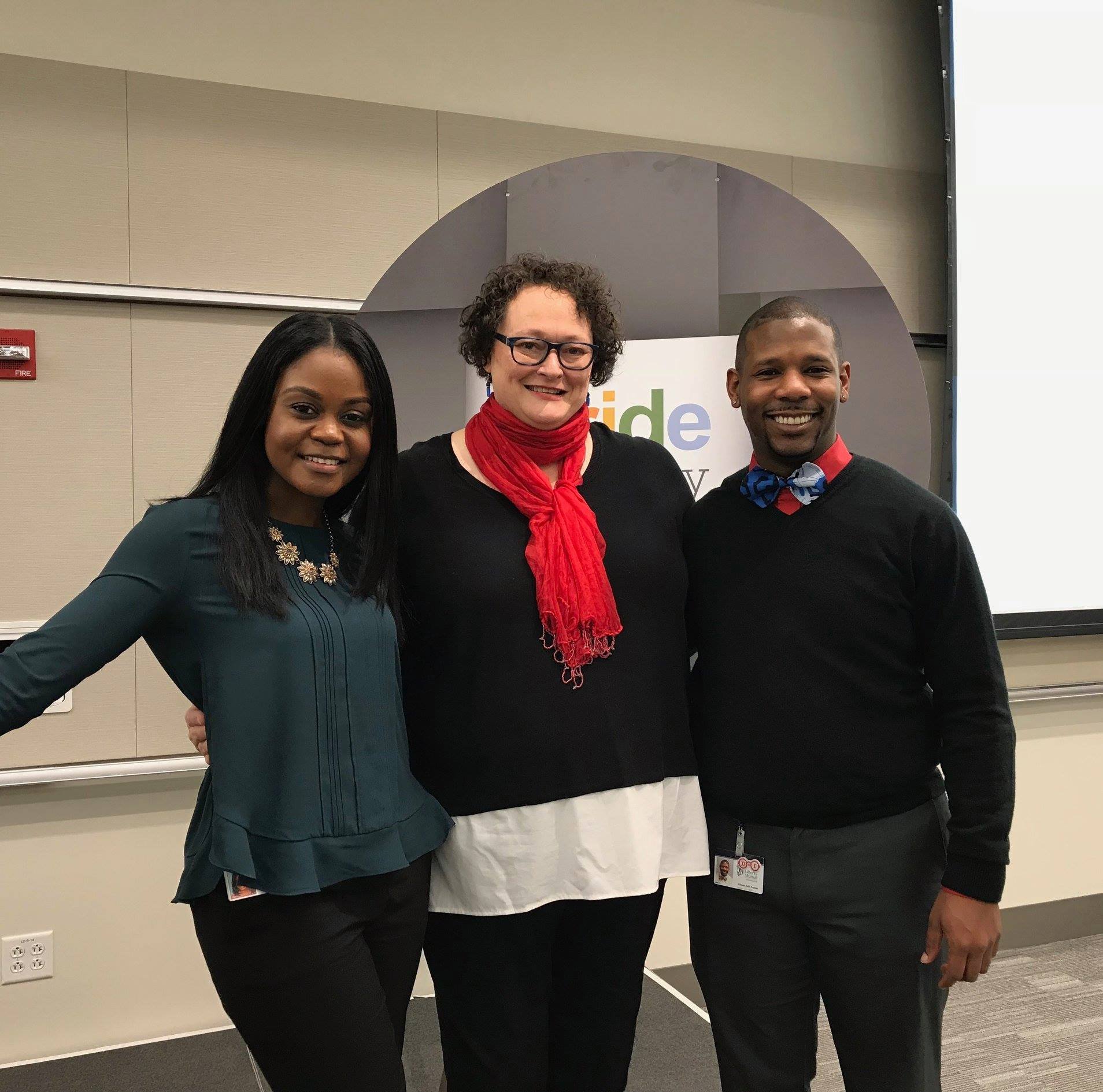 Image: Photo of Marilyn Bennett with two employees of Liberty Mutual