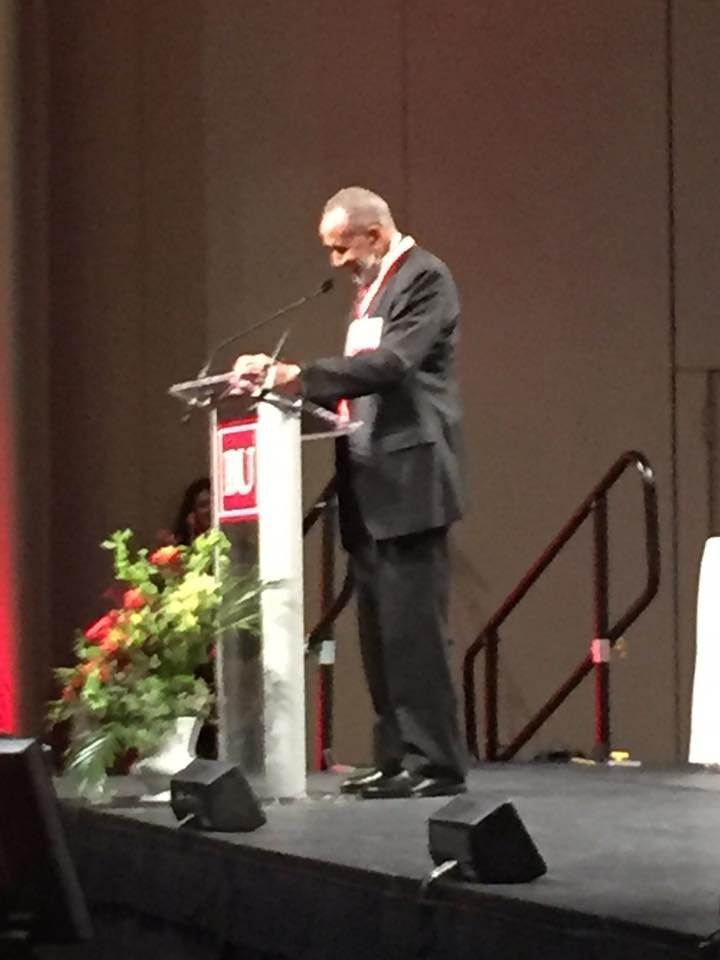 Image: A photo of the Reverend Gil Caldwell speaking at a podium at Boston University