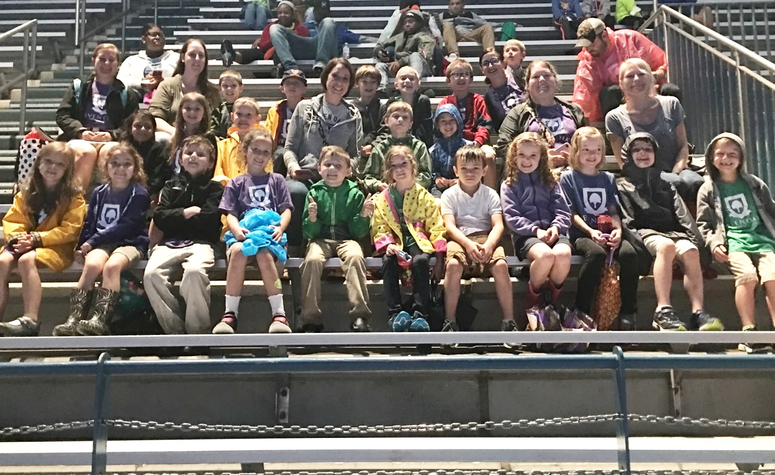 The first grade class takes a seat to watch the dolphin show. 