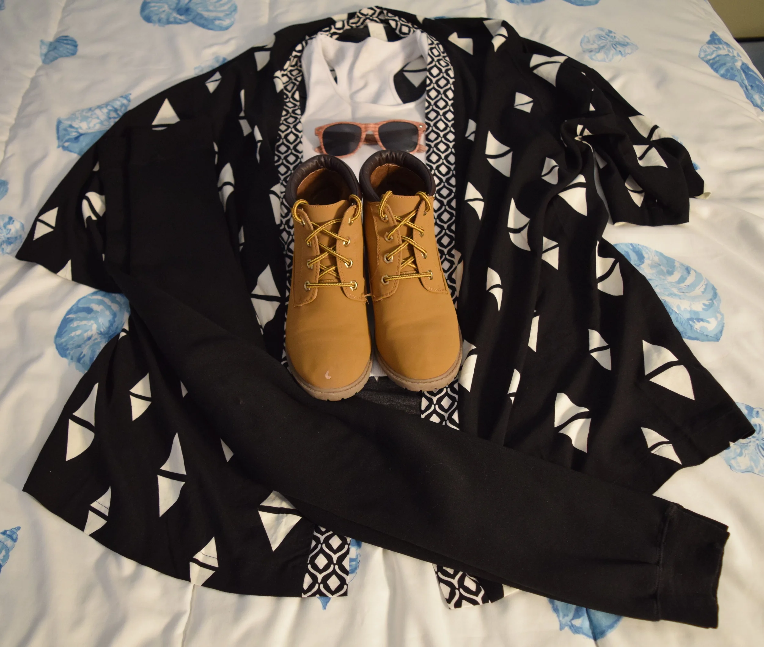 Jacket . Leggings . Tank Top (it's really just a basic tank that you can find anywhere!). Sunglasses (the ones I have are a little lighter). Boots (aren't being sold at Primark anymore, unfortunately).