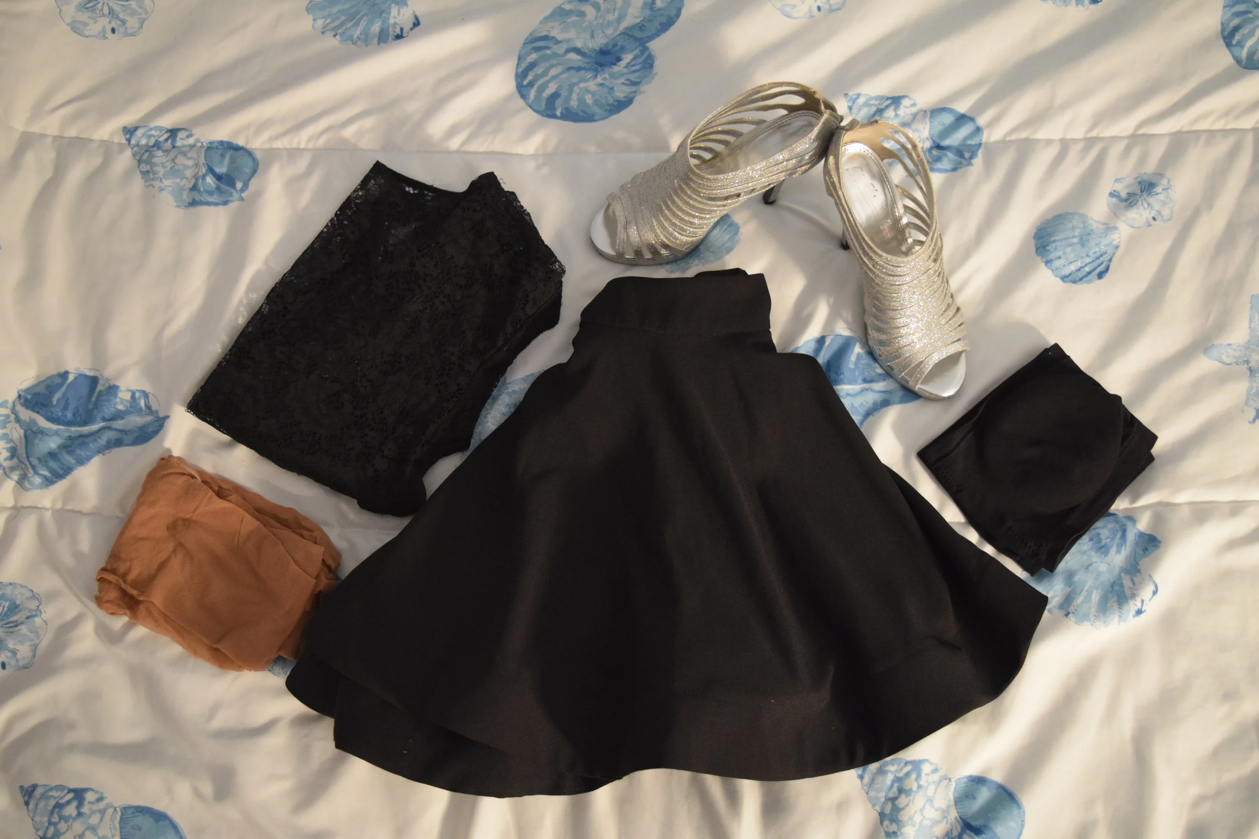 Shirt (I have no clue where I bought this I’m sorry). Bandeau . Skirt (no longer being sold at Mystique Boutique NYC ). Tights . Shoes (similar).