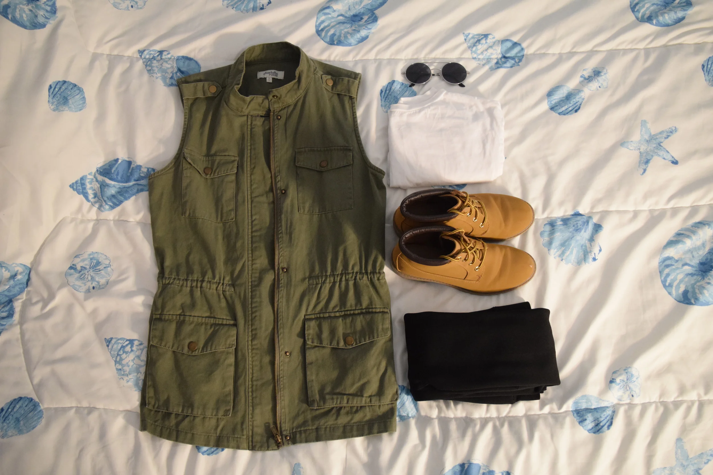 Vest . Sunglasses (similar). Shirt . Boots (no longer being sold at Primark . Leggings .