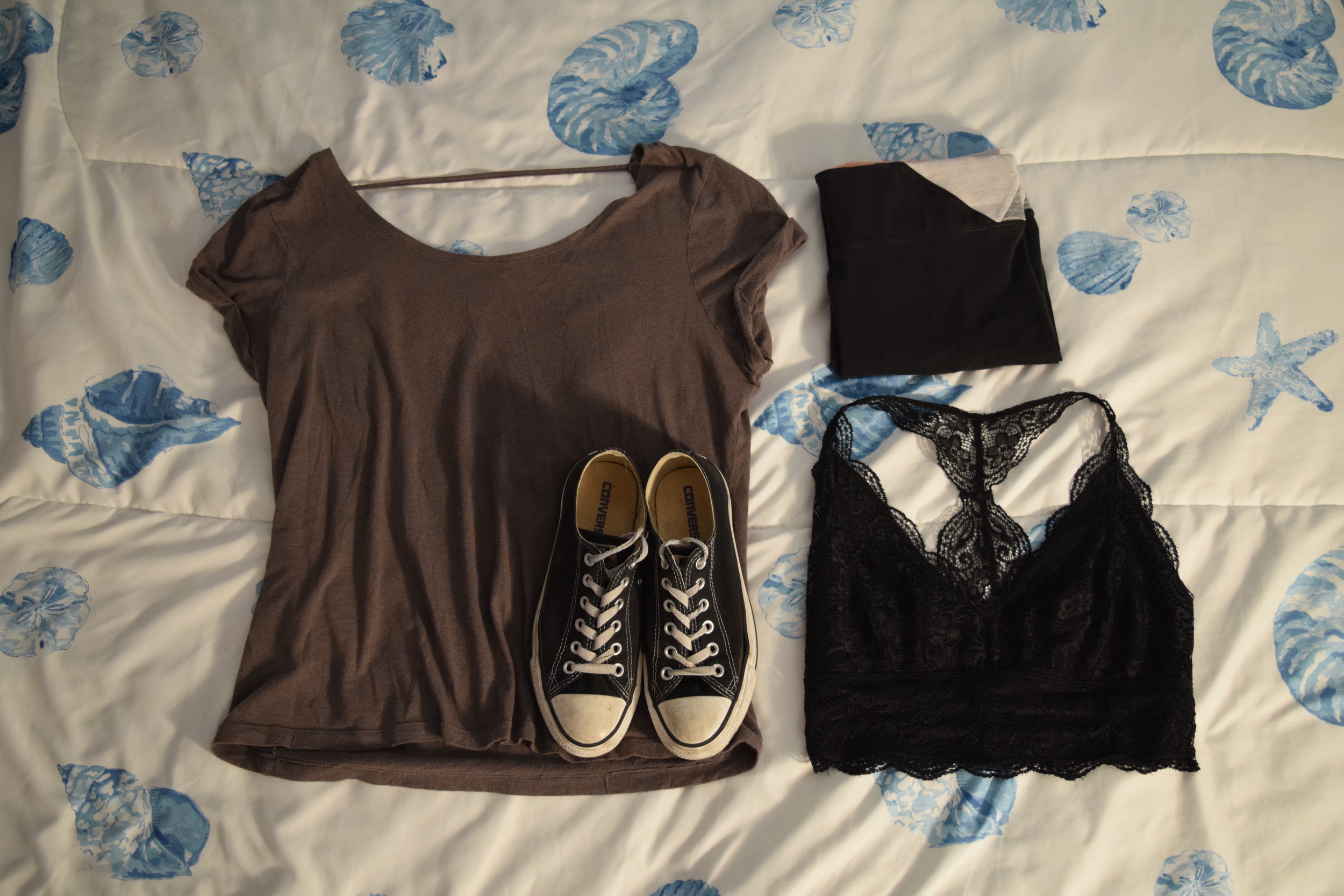 Shirt (no longer being sold at Victoria’s Secret PINK ). Leggings (similar). Sneakers . Bralette .