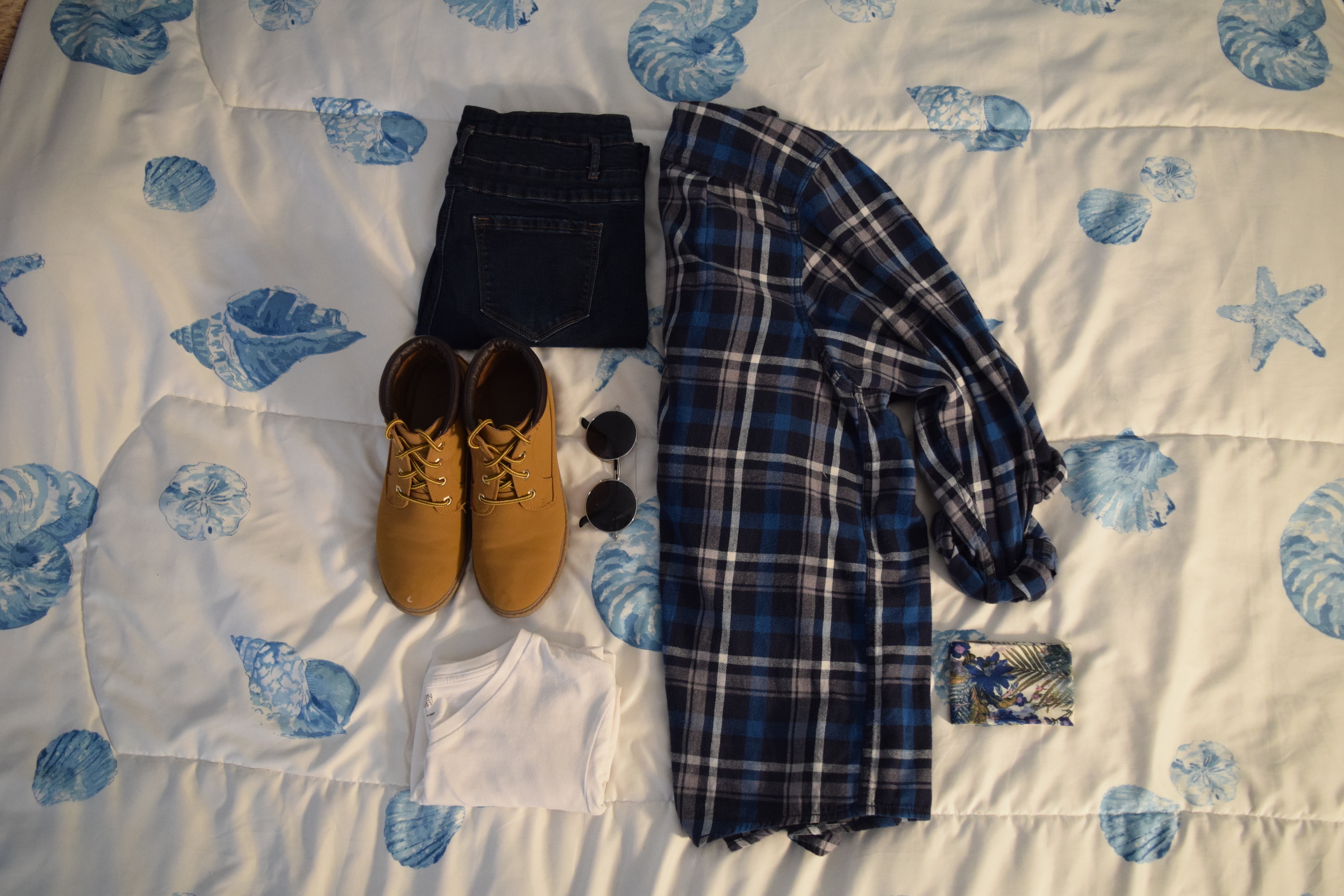 Shirt . Jeans . Boots (no longer being sold at Primark ). Sunglasses (similar). Flannel (no longer being sold at Eddie Bauer ). Headband . 