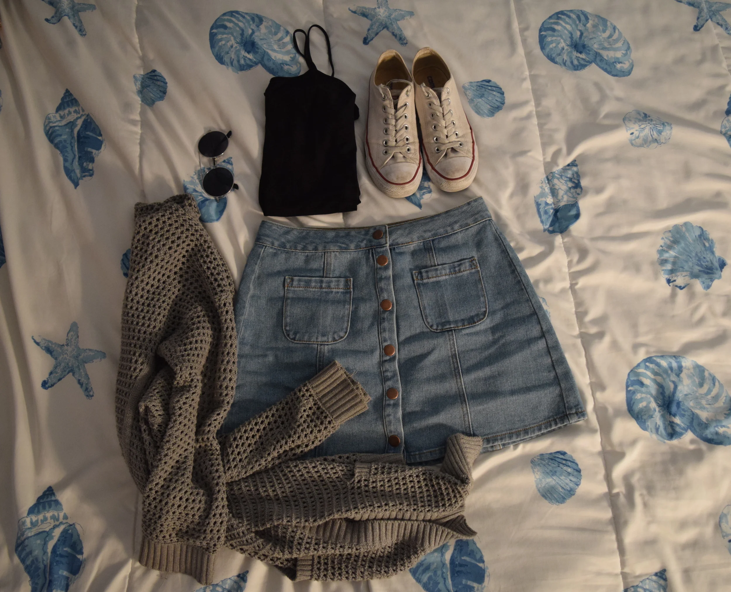 Skirt (different color). Tank top (basic, sold anywhere!). Sweater (no longer being sold at The Gap ). Sneakers . Sunglasses (similar).