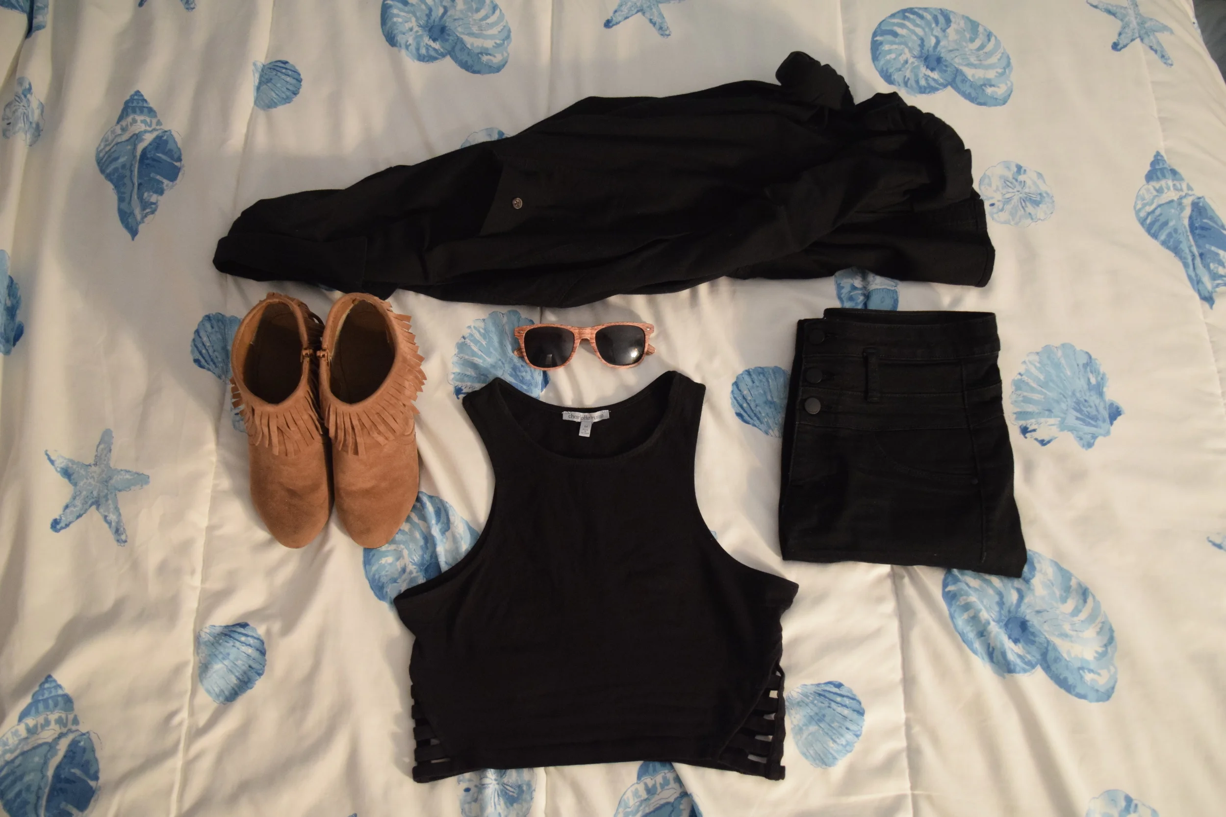 Flannel (no longer being sold at Eddie Bauer ). Jeans . Top (similar). Shoes (similar). Sunglasses (mine are a bit lighter).