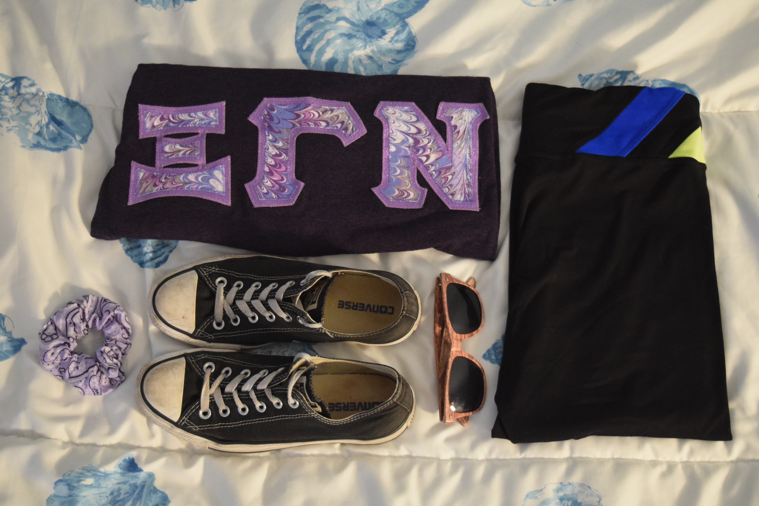 Shirt . Leggings (similar). Sneakers . Sunglasses (mine are a bit lighter). Scrunchie . 