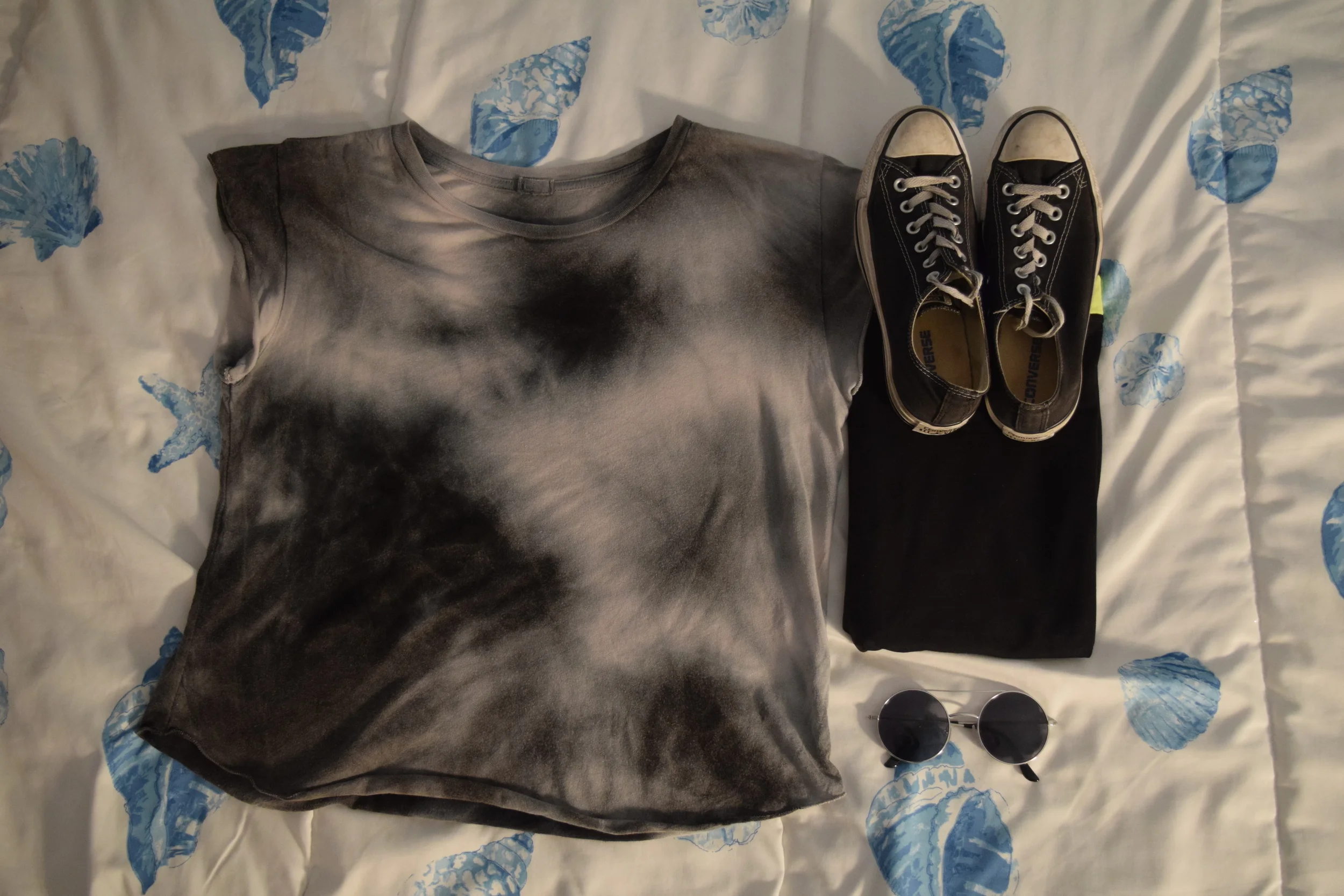 Shirt (from Pacsun by Brandy Melville , but I can't find the exact style online). Leggings (similar). Sneakers . Sunglasses (similar). 
