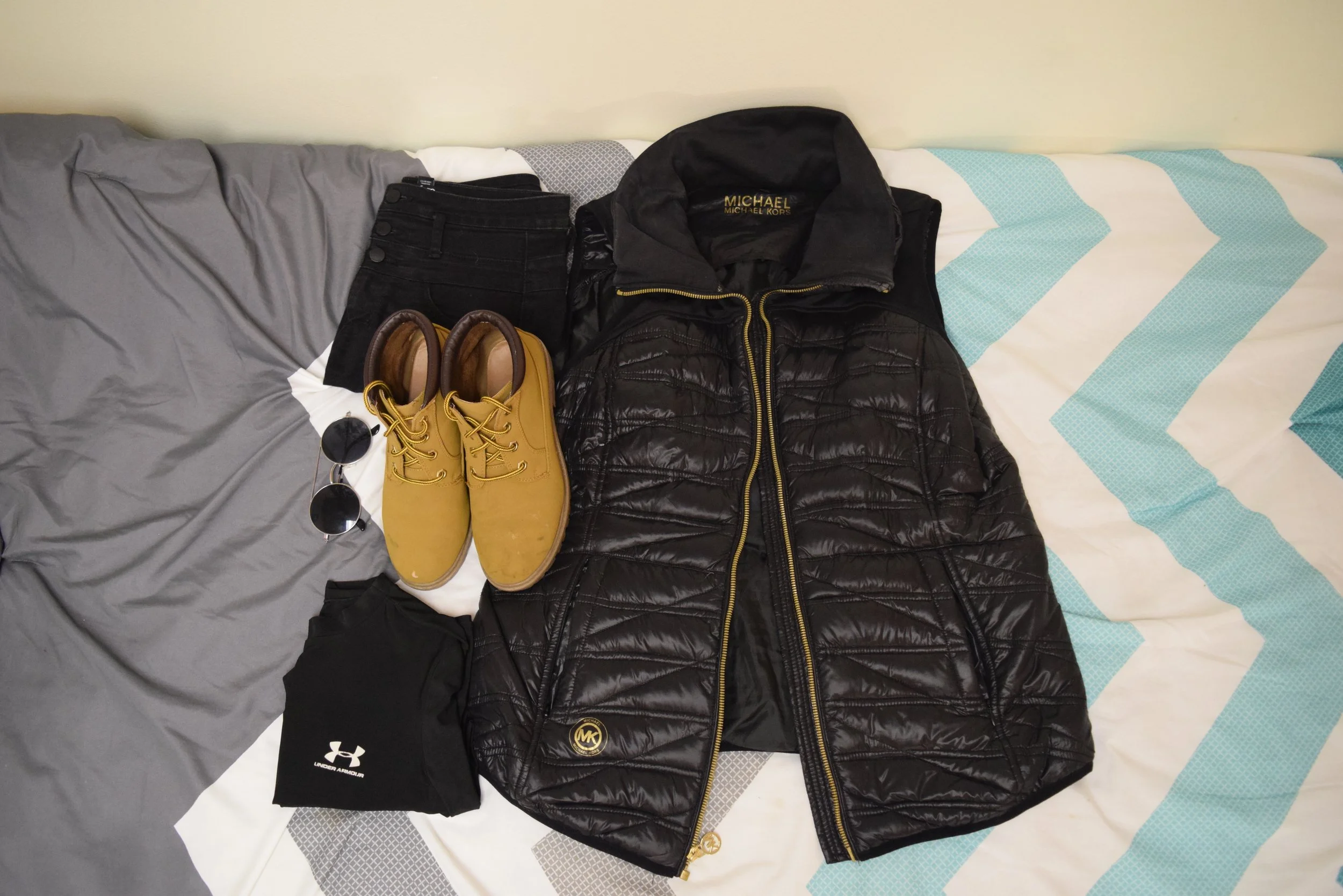 Vest . Shirt (similar). Jeans . Boots (no longer being sold at Primark ). Sunglasses (similar).