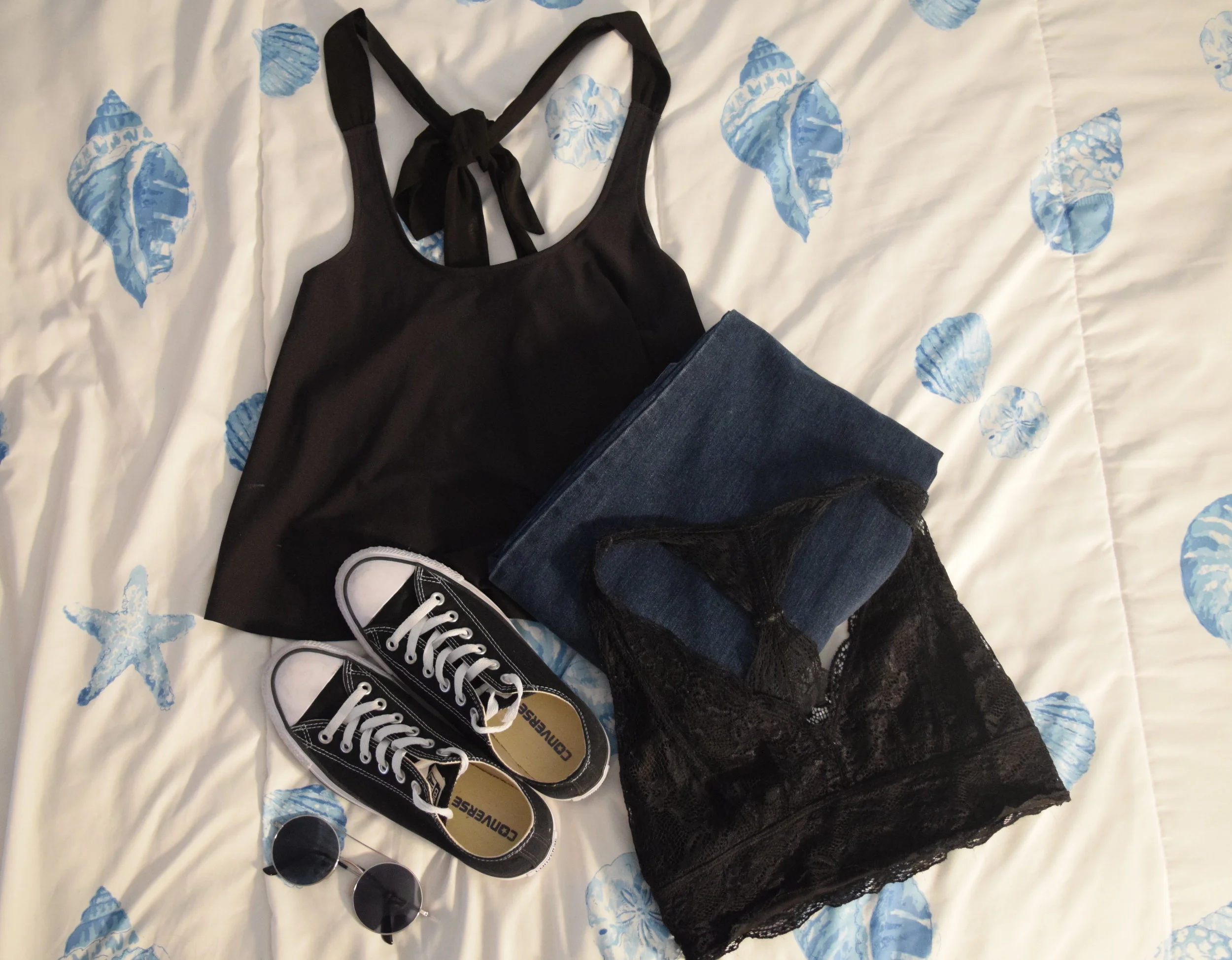Top (no clue I'm sorry). Bralette . Jeans . Sneakers . Sunglasses (similar).