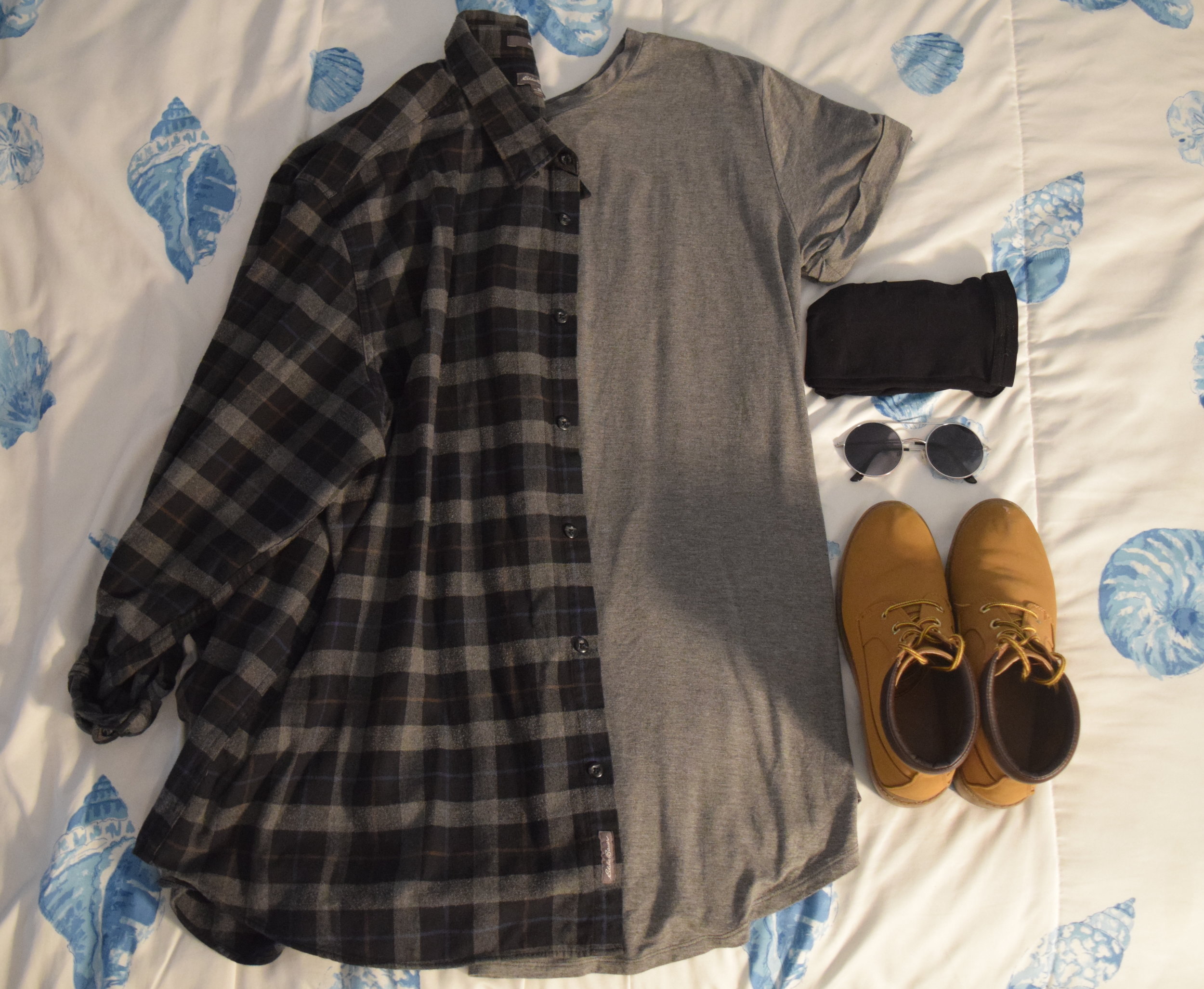 Dress . Flannel (no longer being sold at Eddie Bauer ). Stockings . Sunglasses (similar). Boots (no longer being sold at Primark ). 