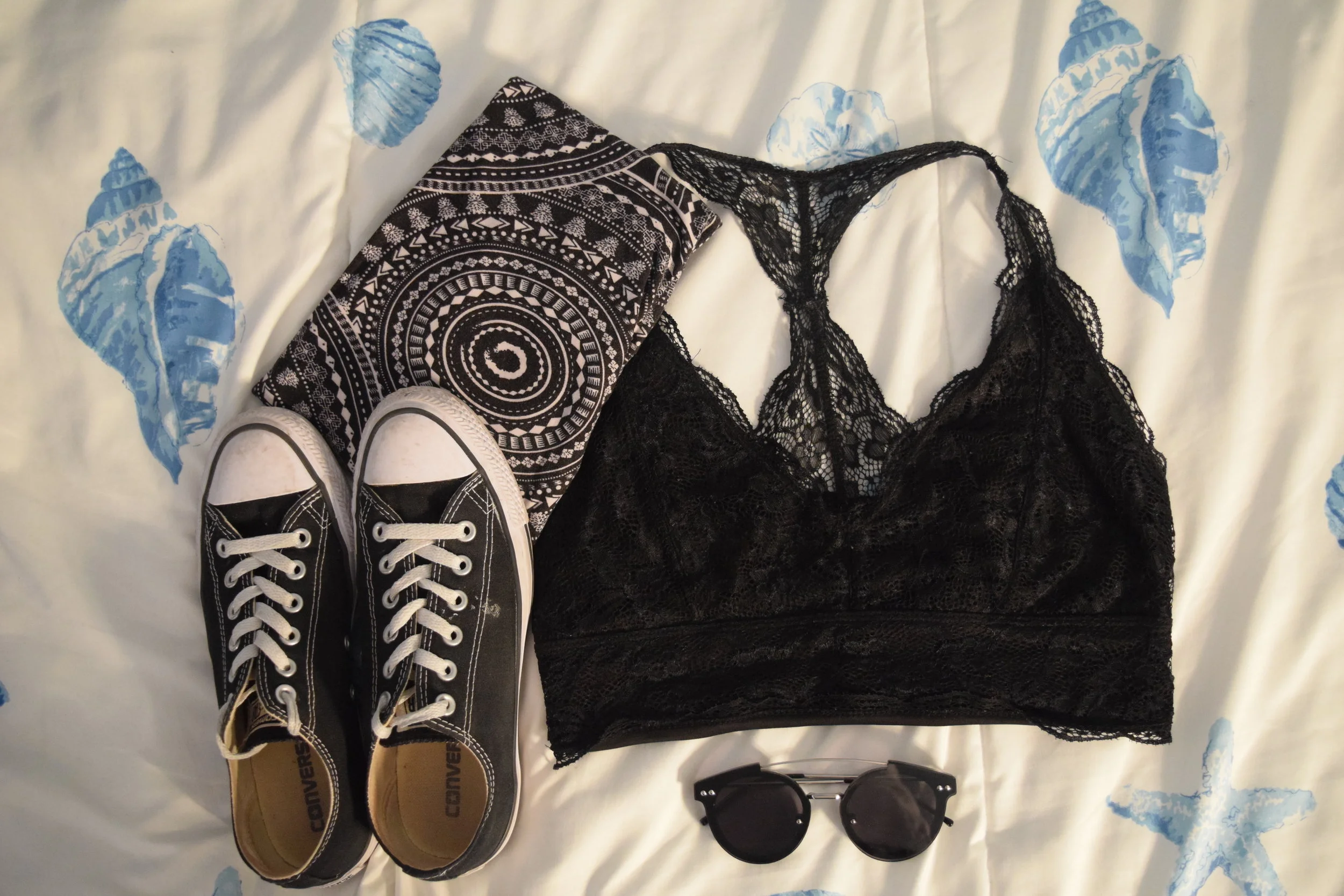 Bralette . Pants (no clue I'm sorry). Sneakers . Sunglasses .