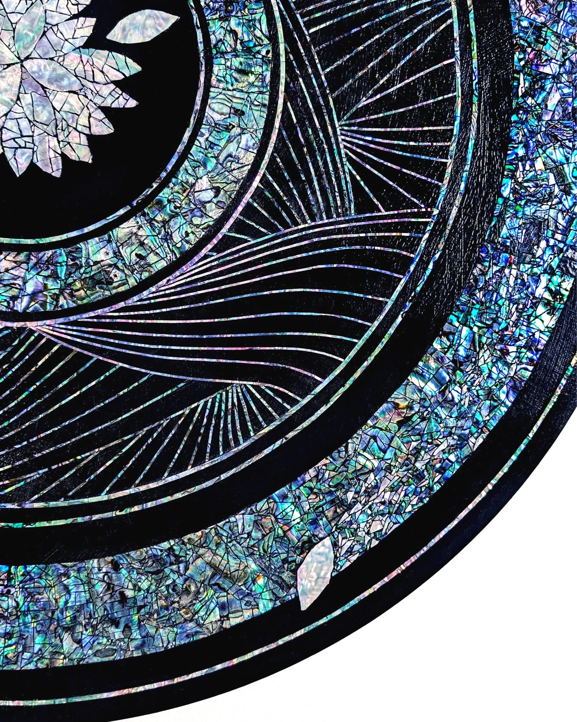  Detail of Sang   Korean mother-of-pearl, New Zealand mother-of-pearl, acrylic, resin on panel with foldable table legs  25” diameter 