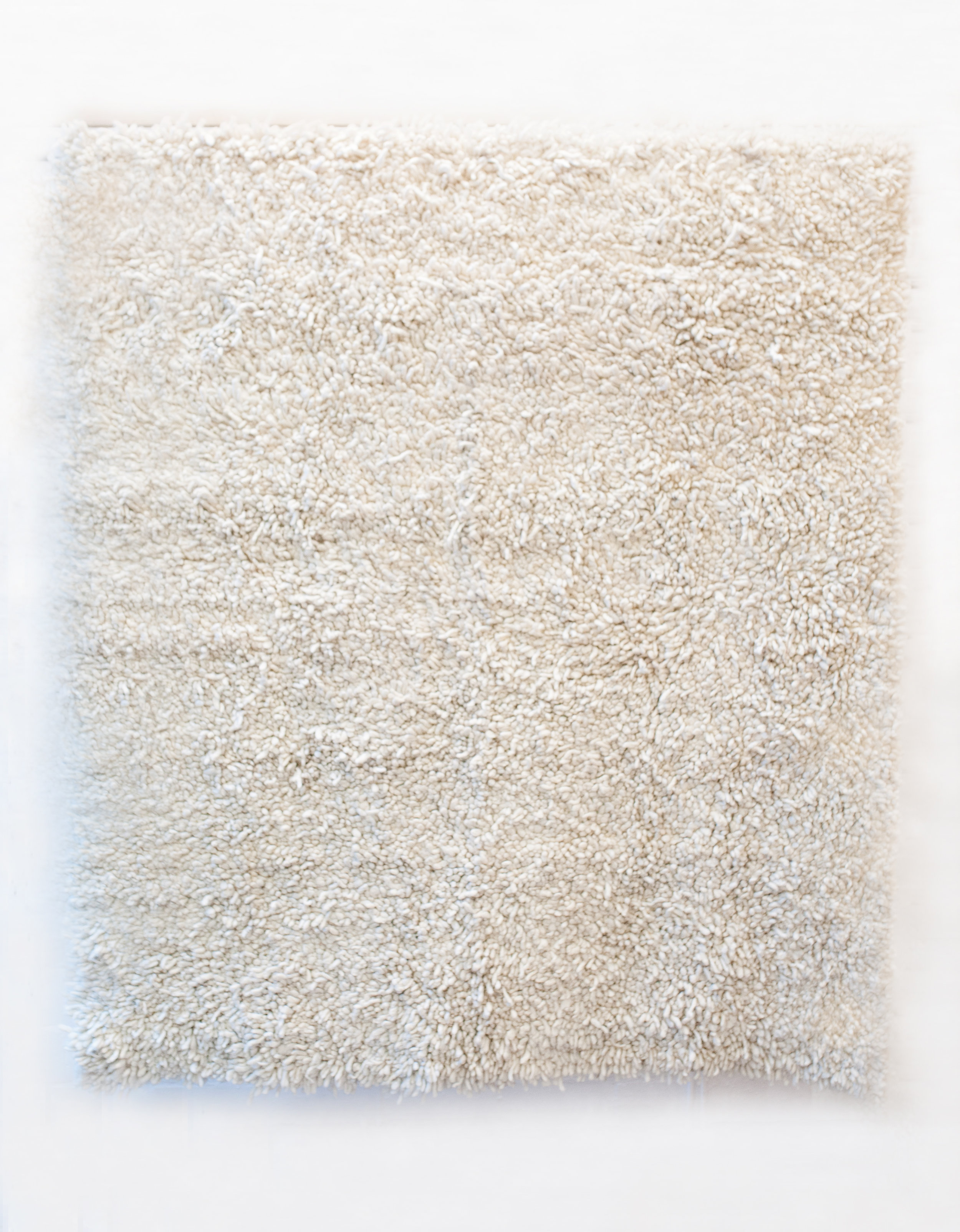 white karakul rug - tufted weave.jpg