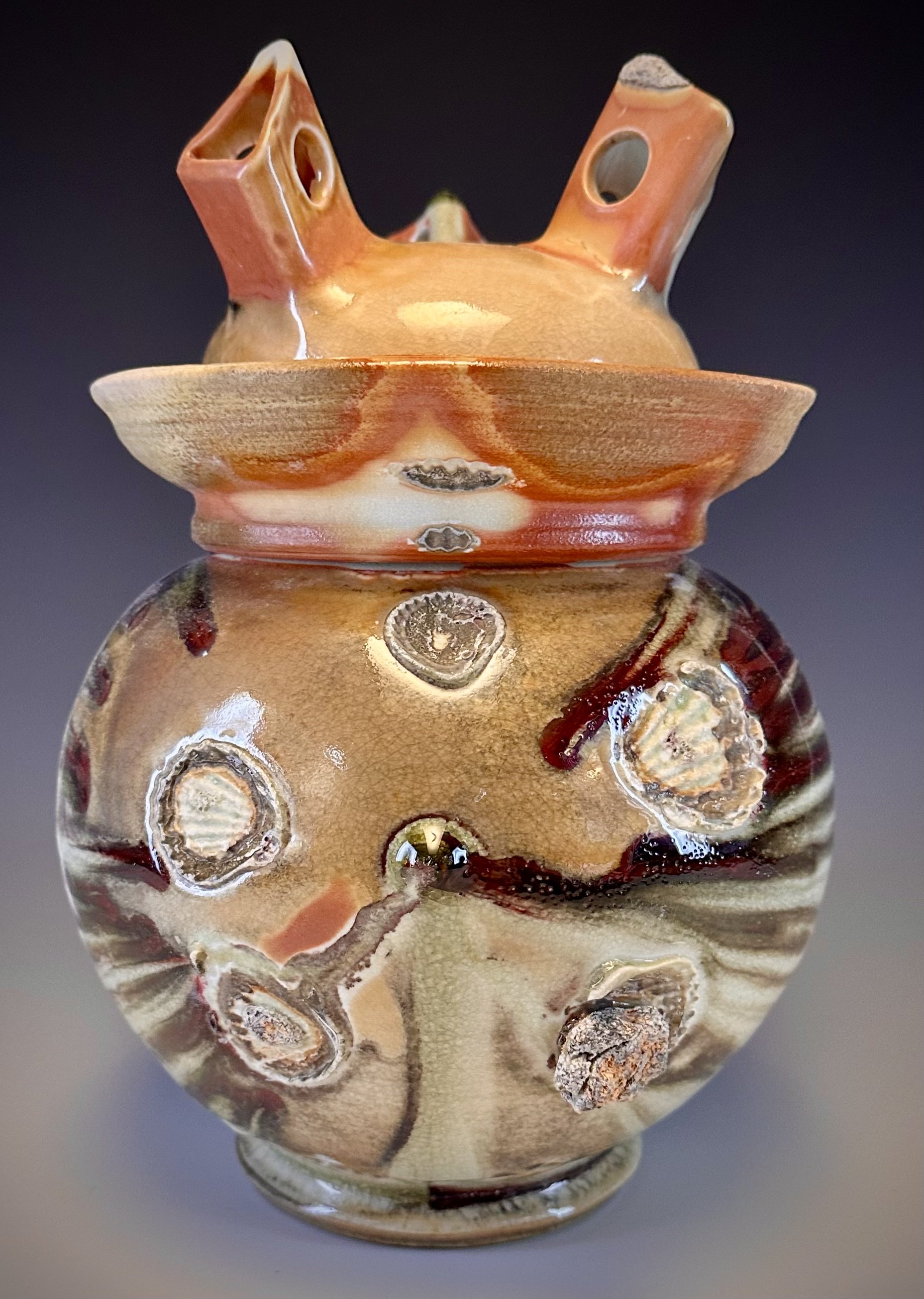 Shino & Oribe over porcelain wood fired to cone 12+