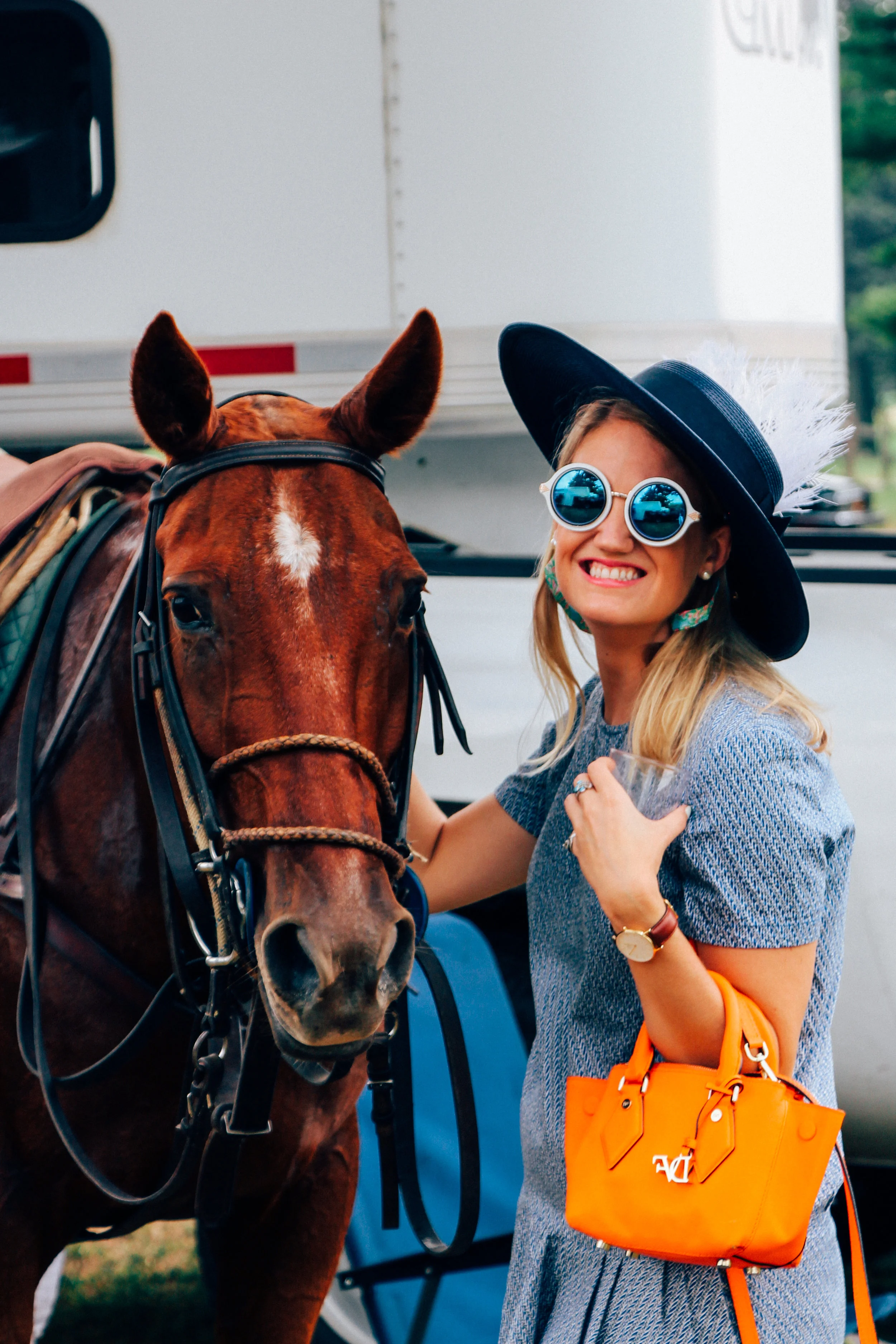 The always lovely Meg Towner with her annual picture next to one of the horses. 