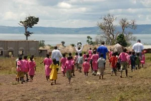 New friends made during a Church-to-Church partnership trip to Uganda.
