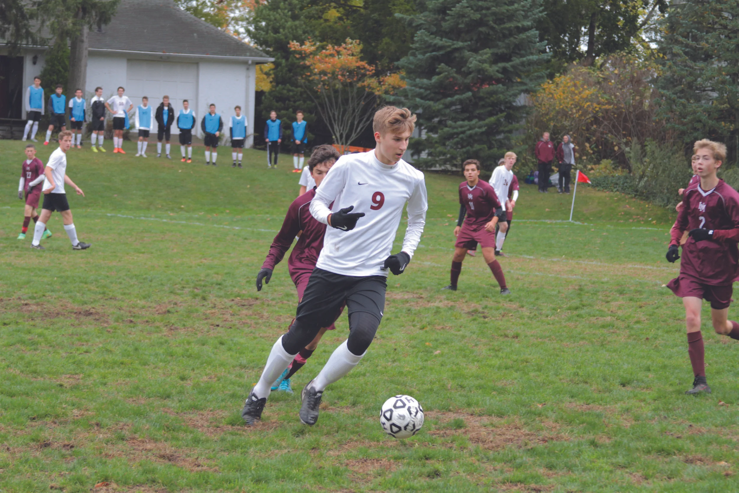 Photo Courtesy of Maria Hatzioanidis Julian Burden Taking on Horace Mann During the Boys' Varsity Soccer Game.