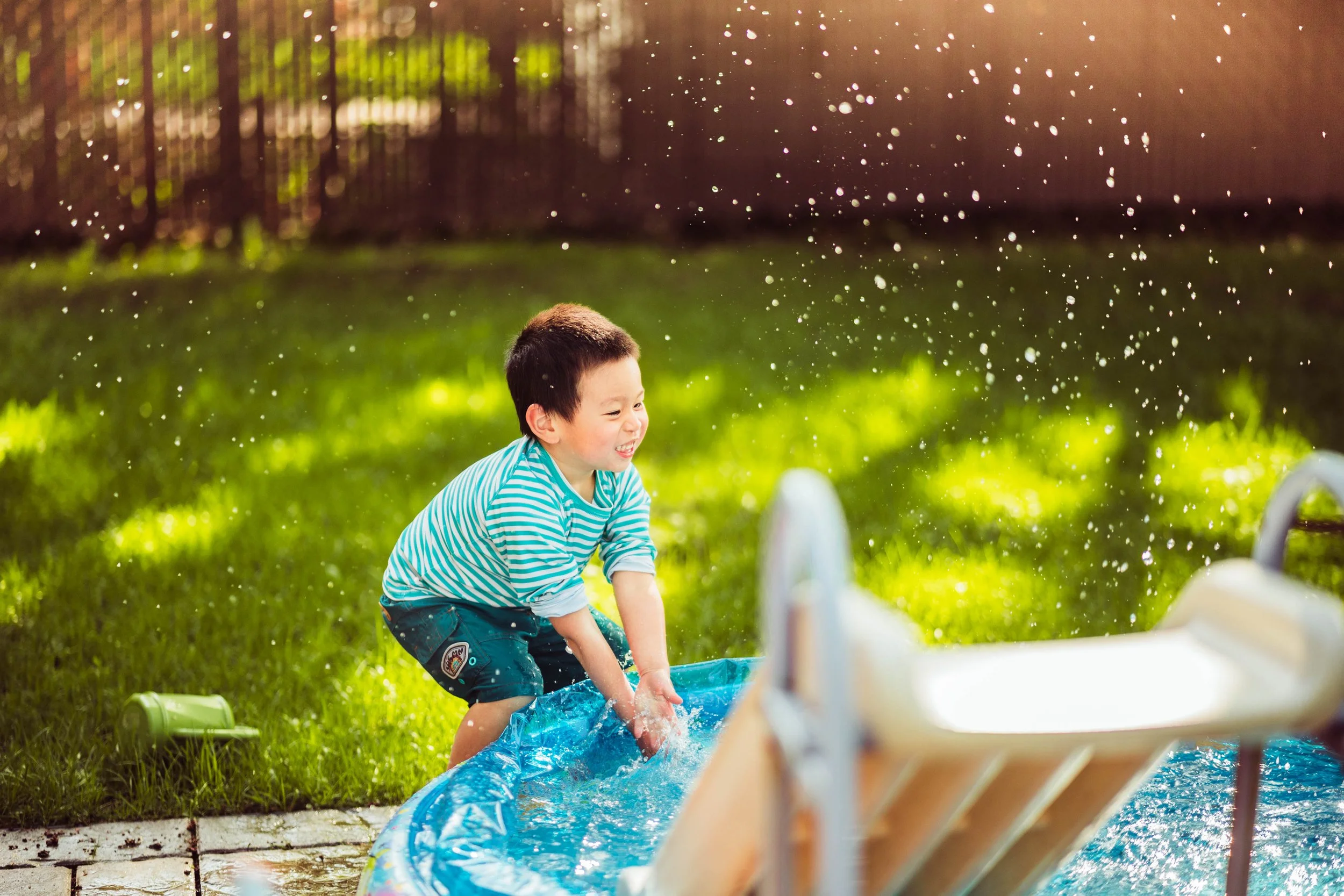 Andy Playing with Water at Backyard