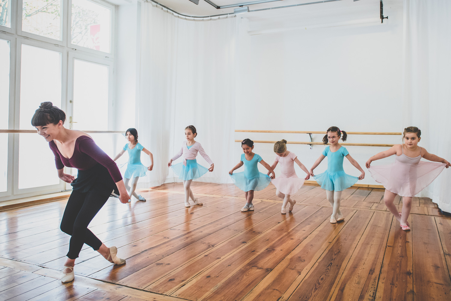 5 year-old girls in ballet class doing curtsy