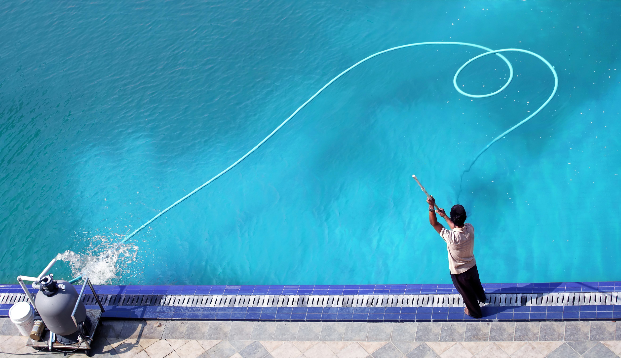 bigstock-pool-cleaning-5708416.jpg