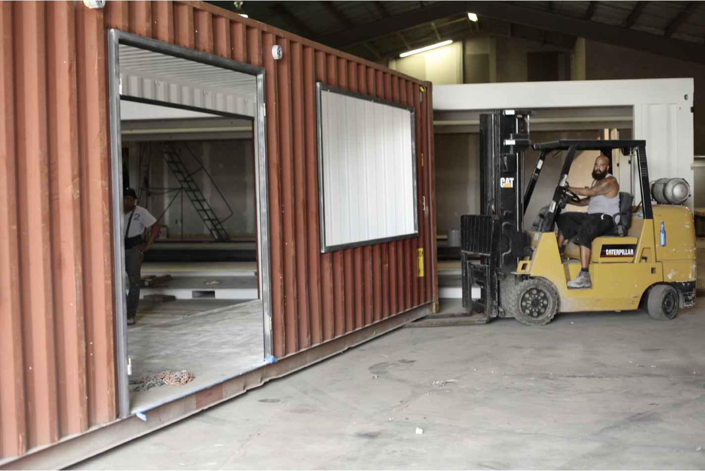 Jay Lopez, shop king of Little River Box Company, prepping the container for transport.