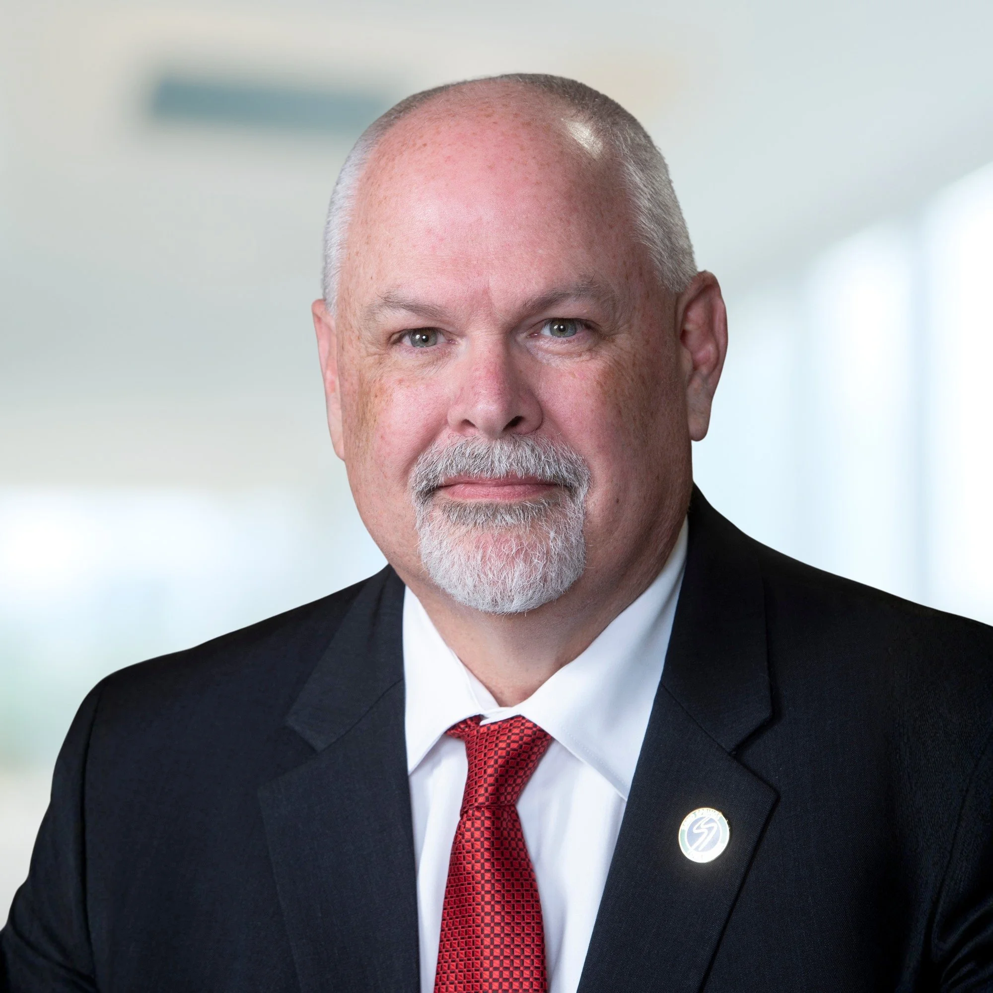 Trustee, Mike Carter
