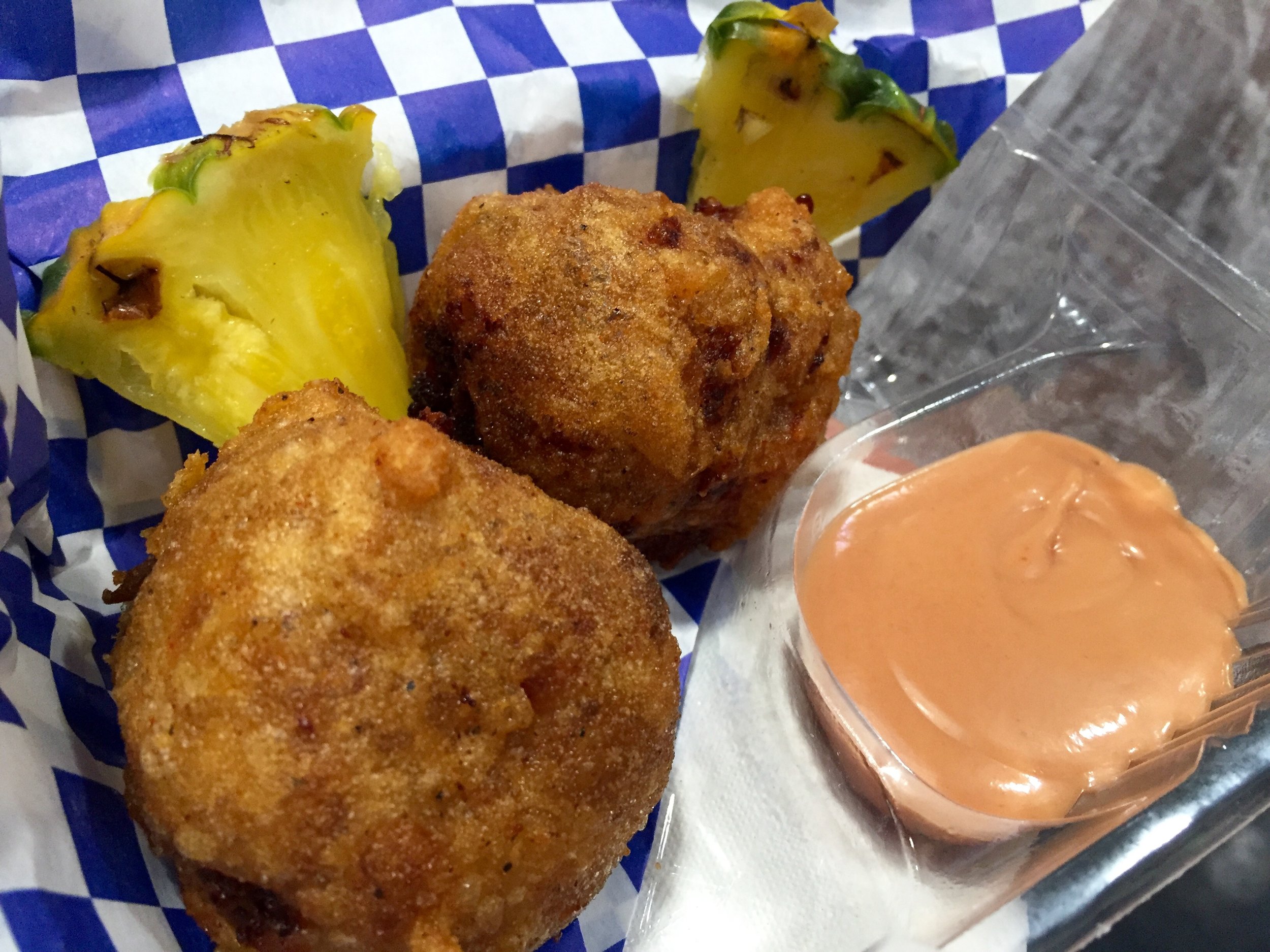 Photo Credit: Anna Bryant This is a funyun stuffed with pulled pork, cheese, pineapple, and bacon. Need I say more?