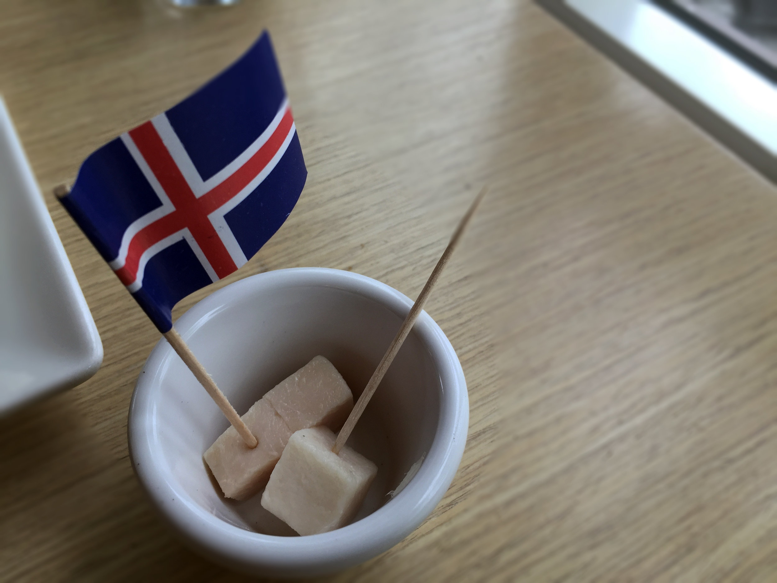Photo Credit: Anna Bryant It looks so innocent, like samples of turkey in the grocery store. Don't be fooled. This little cube is packing the punch of strong fermented shark. 