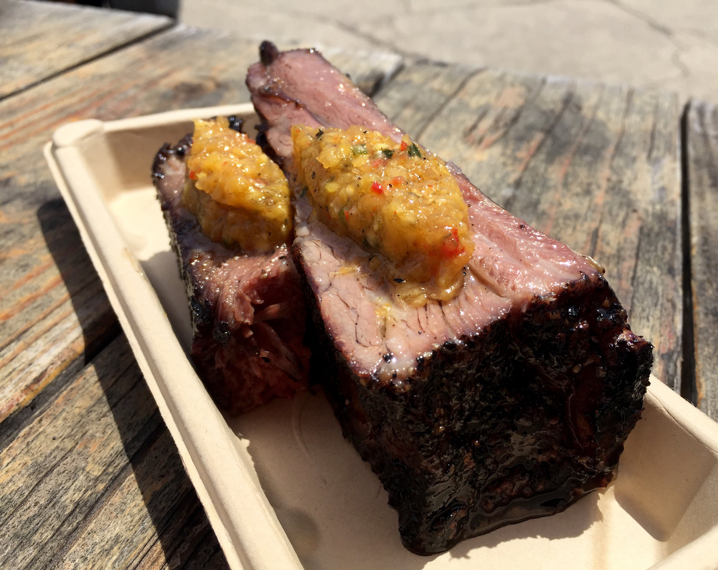 Photo Credit: Anna Bryant This is my #mcm every week....that stands for meat crush Monday, right? this beef rib is so tender it falls off the bone and goes great with the pineapple salsa on top.