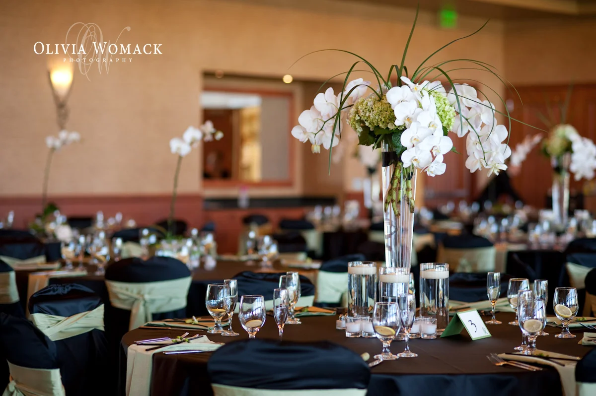 Tall white phale orhid centerpiece with hydrangea and white floating candles.jpg