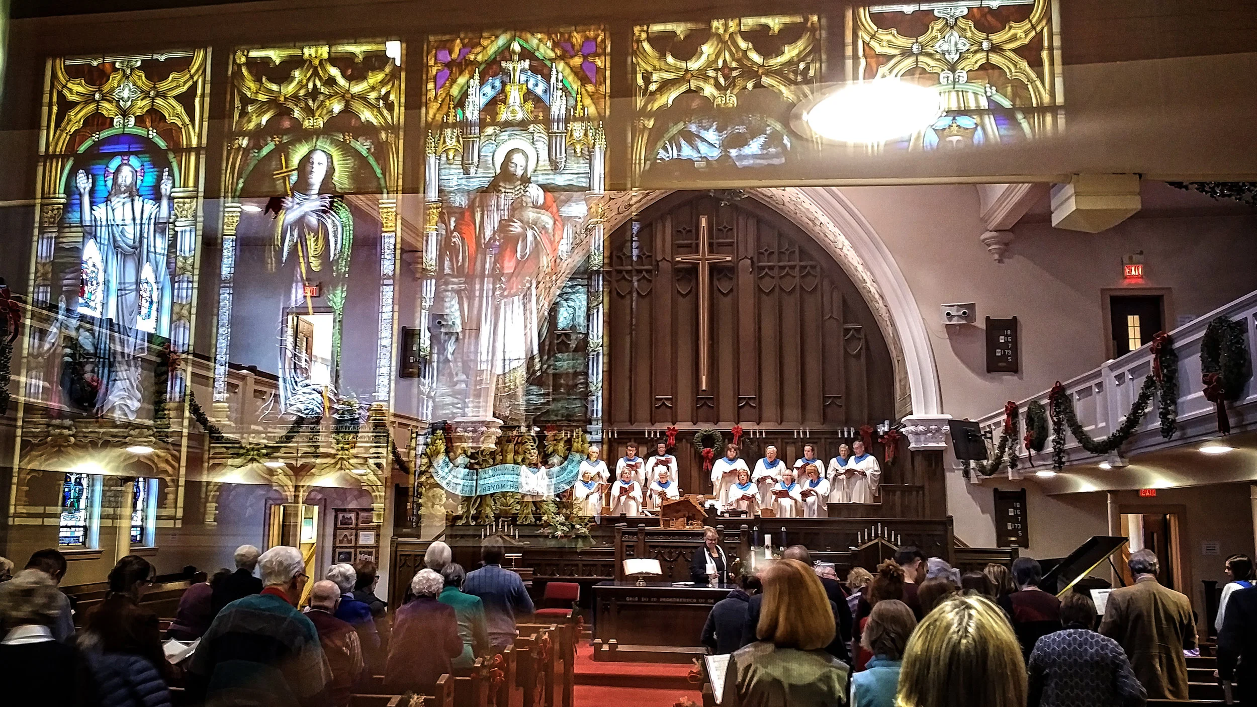 Narthax Window reflecting over 2016 Advent Service.jpg
