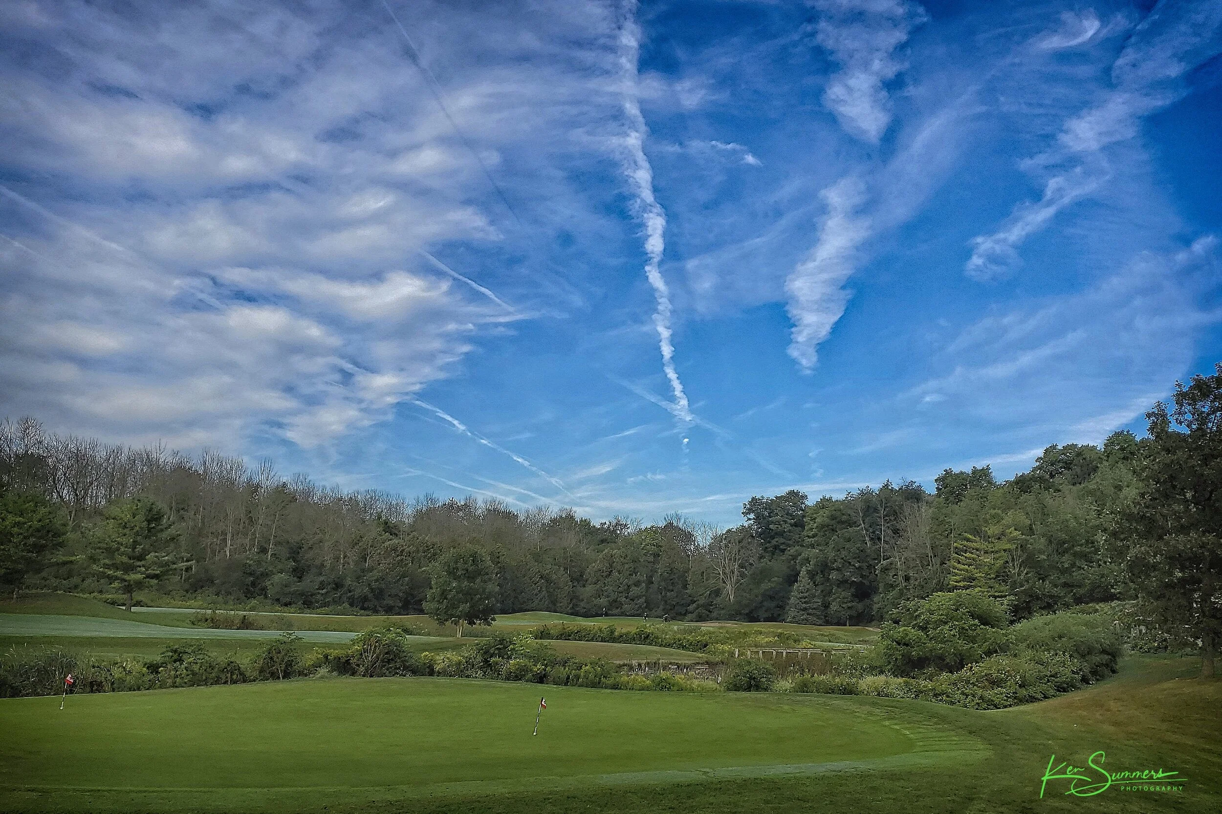 RiverEdge Golf and Contrails   IMG_0160-1.jpg