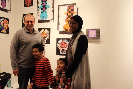 Yezen, the boy in striped shirt, likes painting with colors the best.  "Art is better than math."