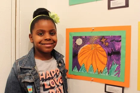 Lamina, a 2nd grader, likes to think about art and come up with ideas for pieces and actually create them!
