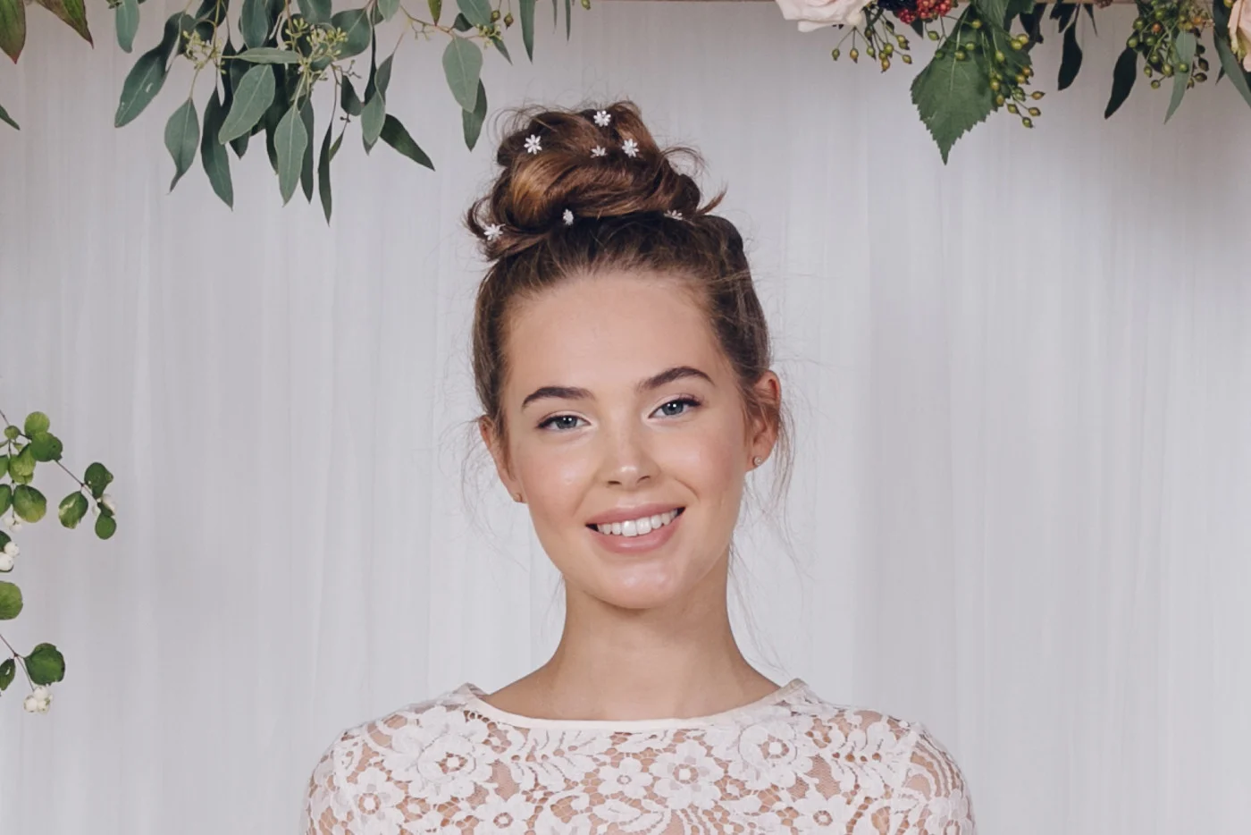Daisy_mother_of_pearl_flower_hair_pins_with_rose_gold_centres_in_top_knot_up_do_9.jpg