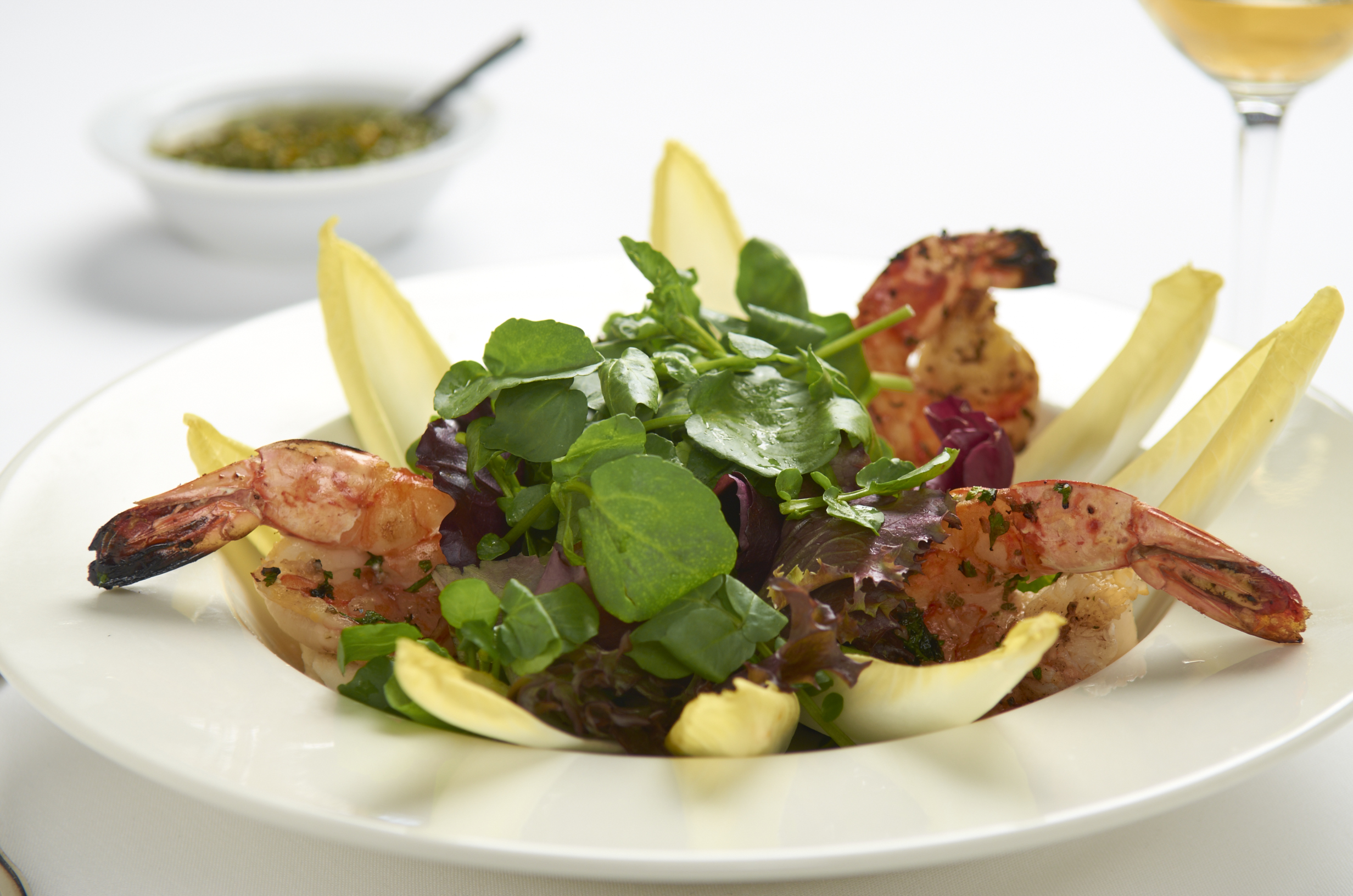 Belgian Endives, Organic Watercress, Grilled Prawns, Tomato-Chimichurri Dressing.