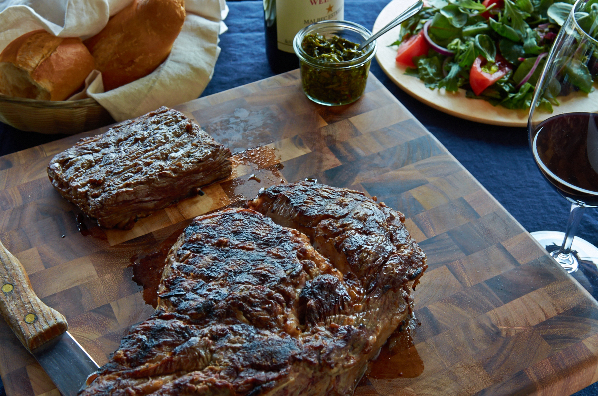 Bone In Rib Eye for Two and Rib Eye Cap, accompanied by Gardel's Chimichurri Auténtico , Ensalada Mixta and 1977 Bodega Weinert Malbec Estrella.