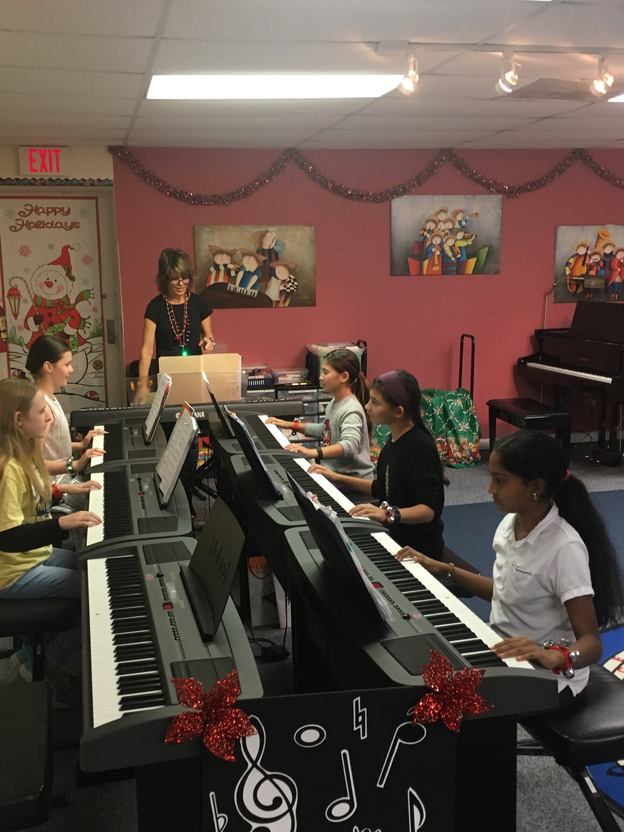  One of Ms JoAnn's group piano Holiday recitals. 