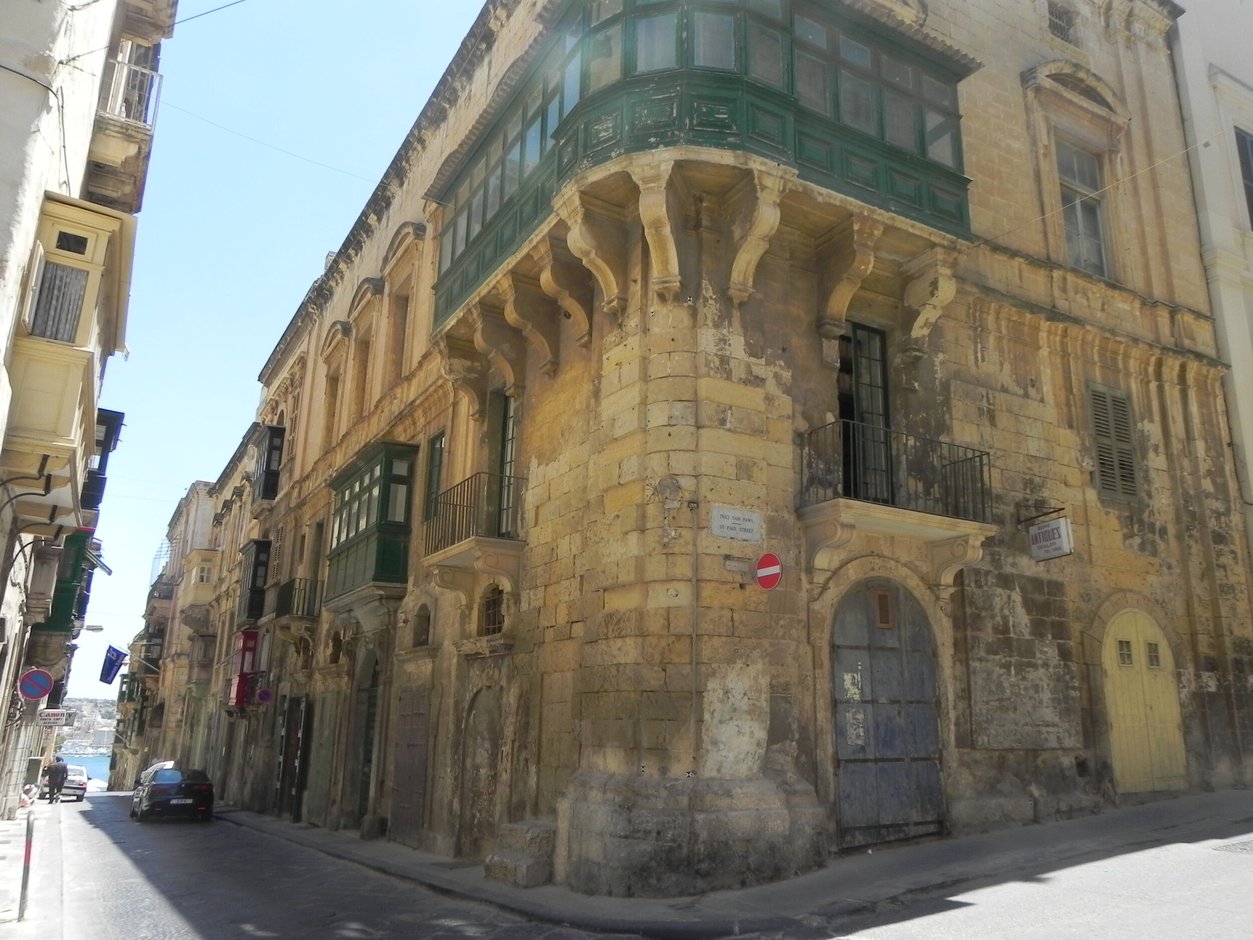  An excellent example of Maltese balconies.  They are enclosed for warmth in the winter and to keep out the dust from the dessert. 