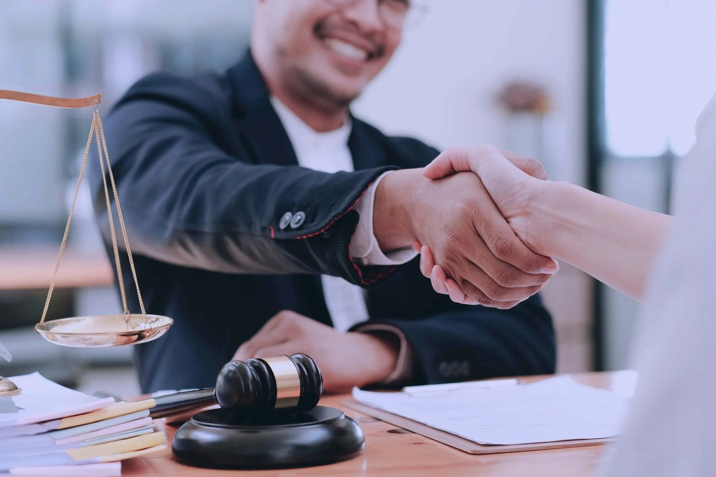 businessman-shaking-hands-to-seal-a-deal-with-his-2025-01-16-13-26-32-utc.jpg