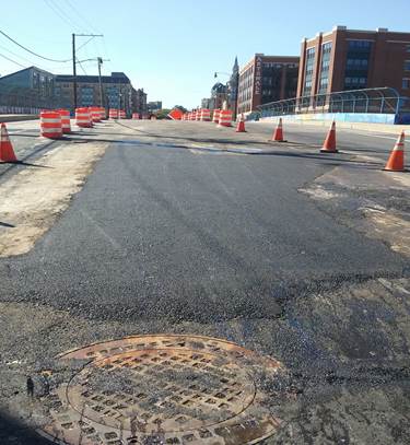 Temporary asphalt over trench at 9th & Monroe