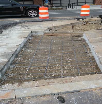Reinforcing for utility cuts repair at 8th & Monroe