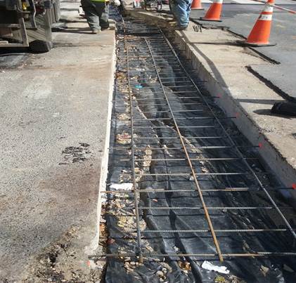 Reinforcement for utility cuts repair at 9th & Monroe