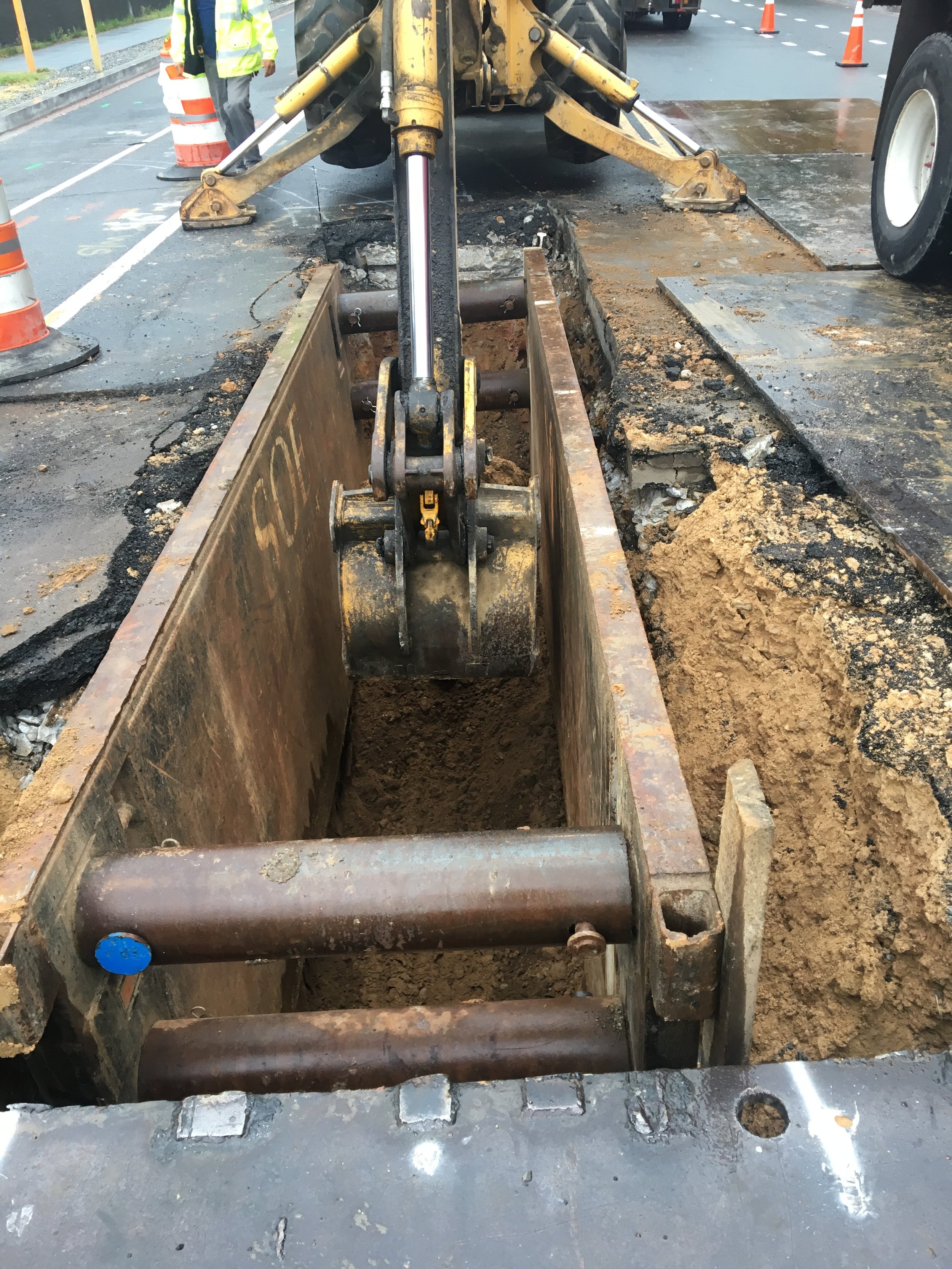 Trenching for fiberglass pipes at the intersection of 9th & Monroe